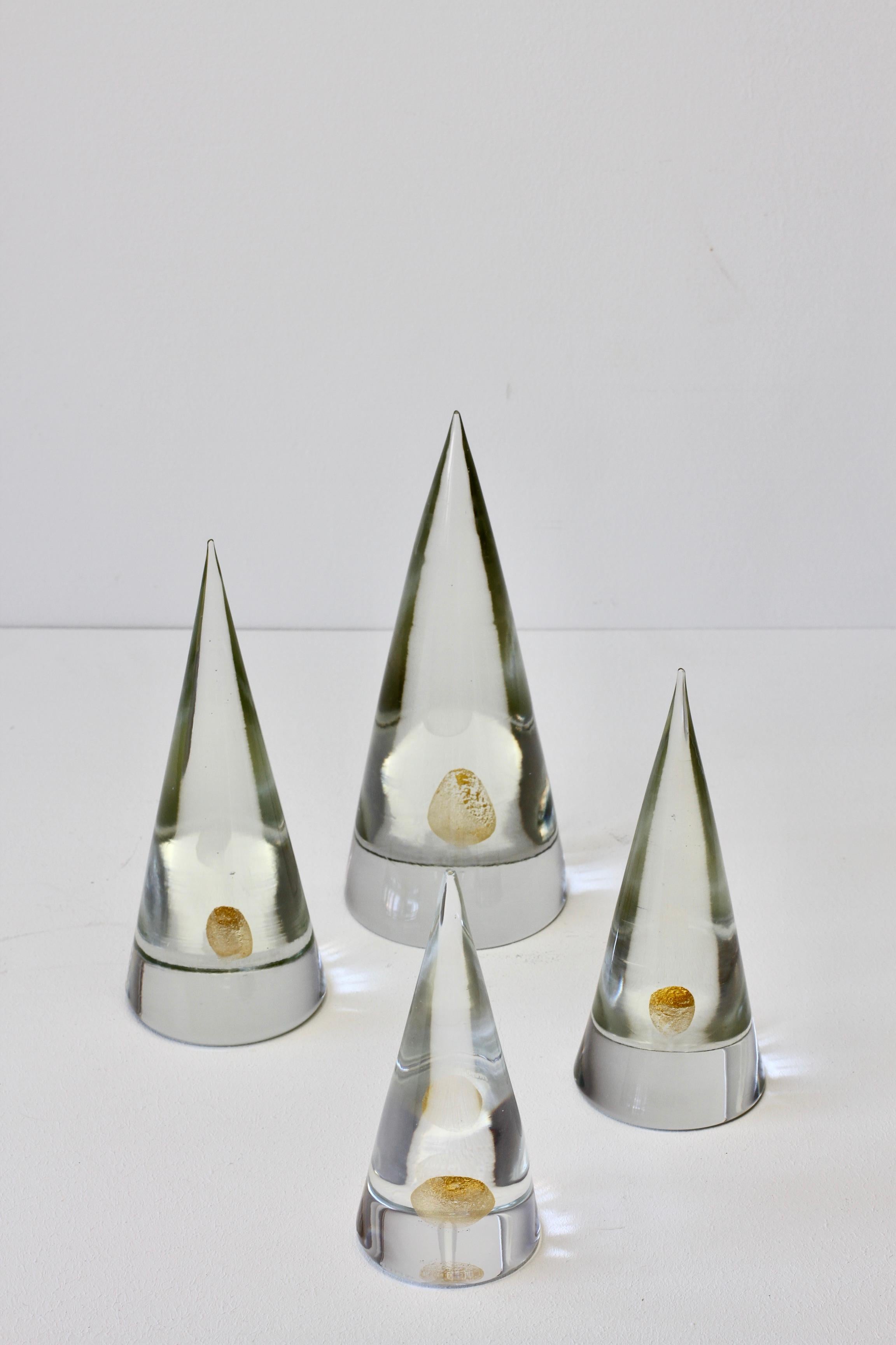 Rare signed set of four cone shaped obelisk paperweights with gold dust inclusions attributed to Antonio da Ros for Cenedese, circa 1960-1970.

Dimensions: 
1 - 23.5cm tall by 10cm diameter
2 - 21.4cm tall by 8.5cm