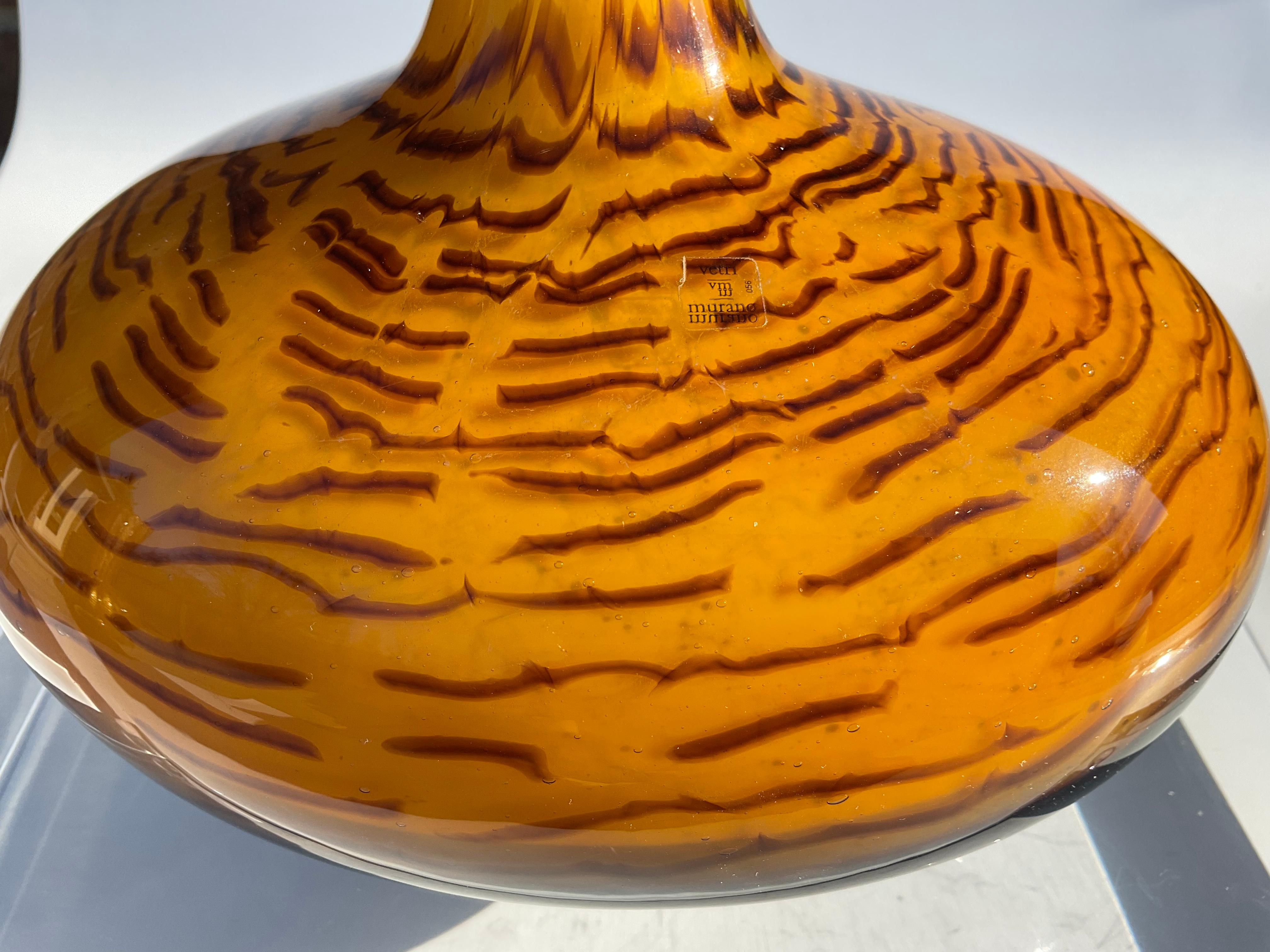 Antonio da Ros Cenedese Fossili Incalmo Murano glass vase in black and amber glass decorated with orange cane segments.
