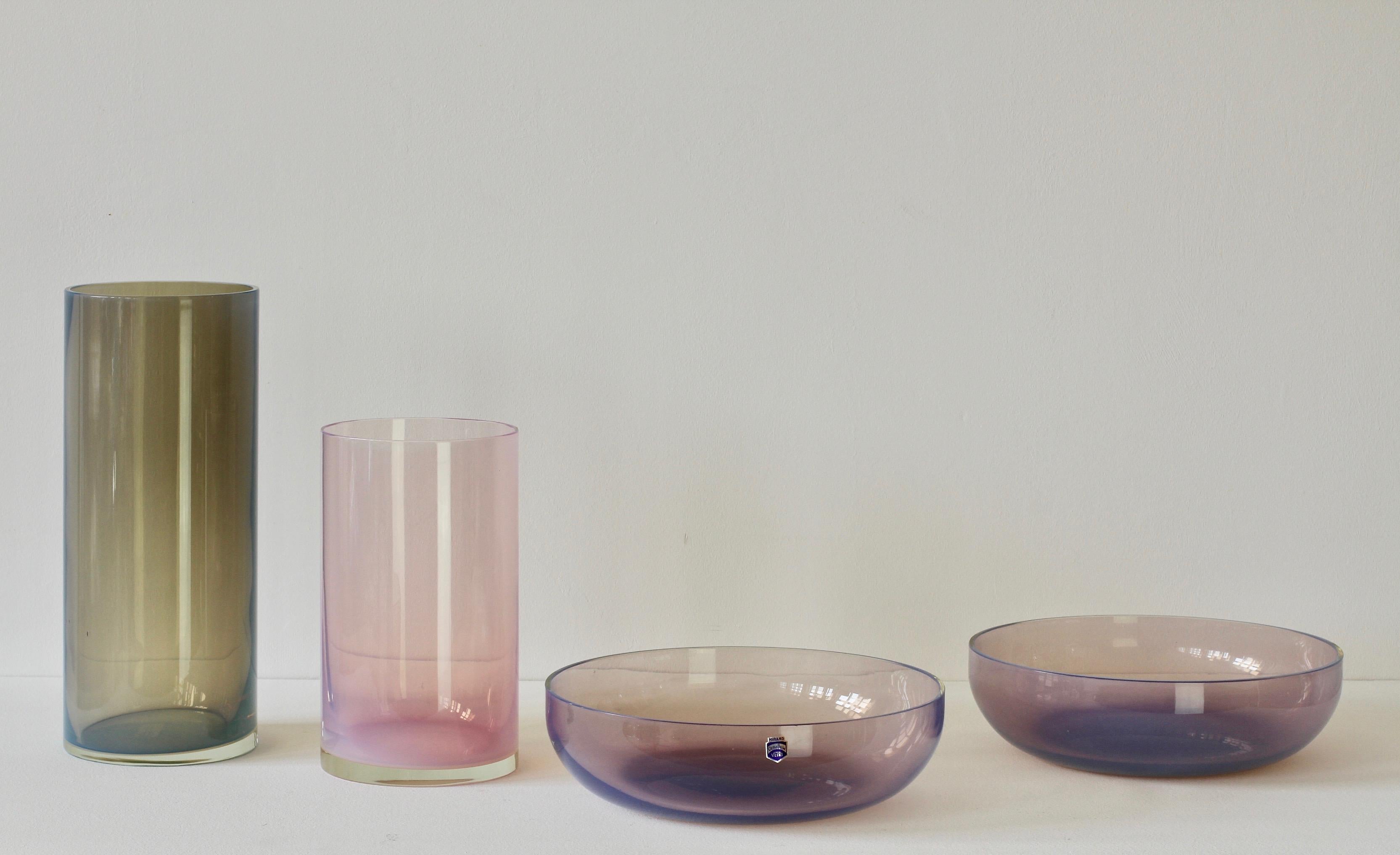 Rare set or ensemble of 'Opalino' Murano glass bowls, vases or vessels designed by Antonio da Ros (1936-2012) for Cenedese, circa 1970-1990. Wonderful translucent colors of vibrant pink, aubergine and moss green. Simplistic yet elegant forms -