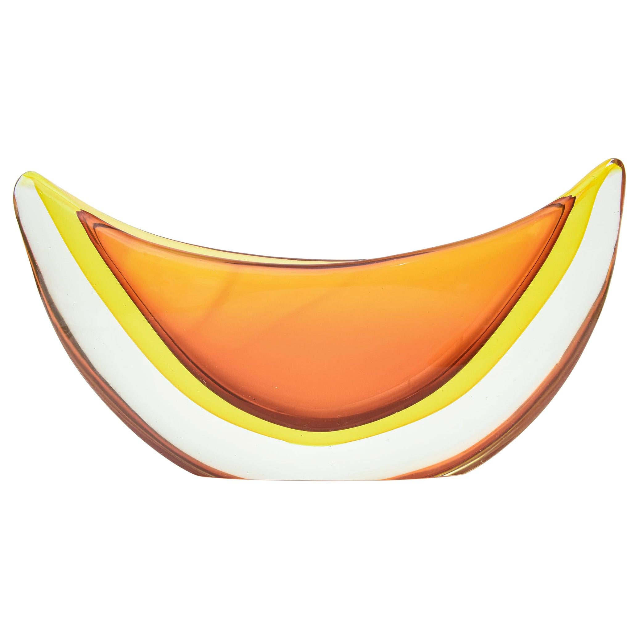 This stunning and monumental Italian Murano vintage Antonio da Ros for Cenedese Sommerso glass bowl vessel or vase is a piece of sculpture in gorgeous colored sommerso glass form. It has the shape of a large orange slice or a canoe form. It is heavy