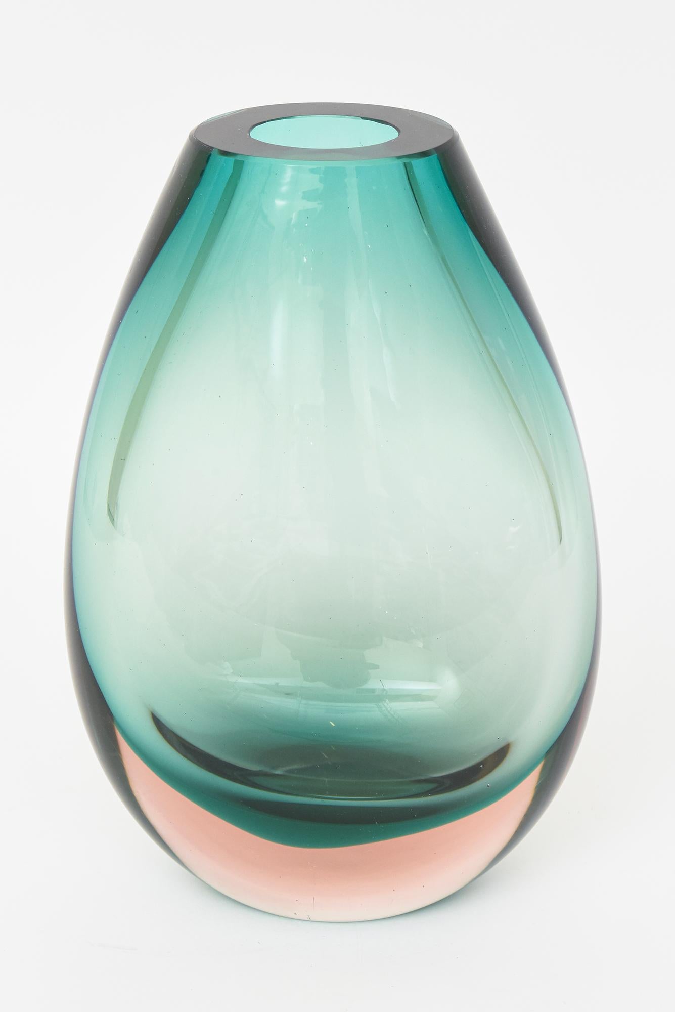 This stunning thick walled tear drop shaped vintage Murano sommerso hand blown glass vase or vessel is by Antonio da Ros for Cenedese. The color of the sea green light emerald teal layers into a peach colored half moon at the bottom with clear glass