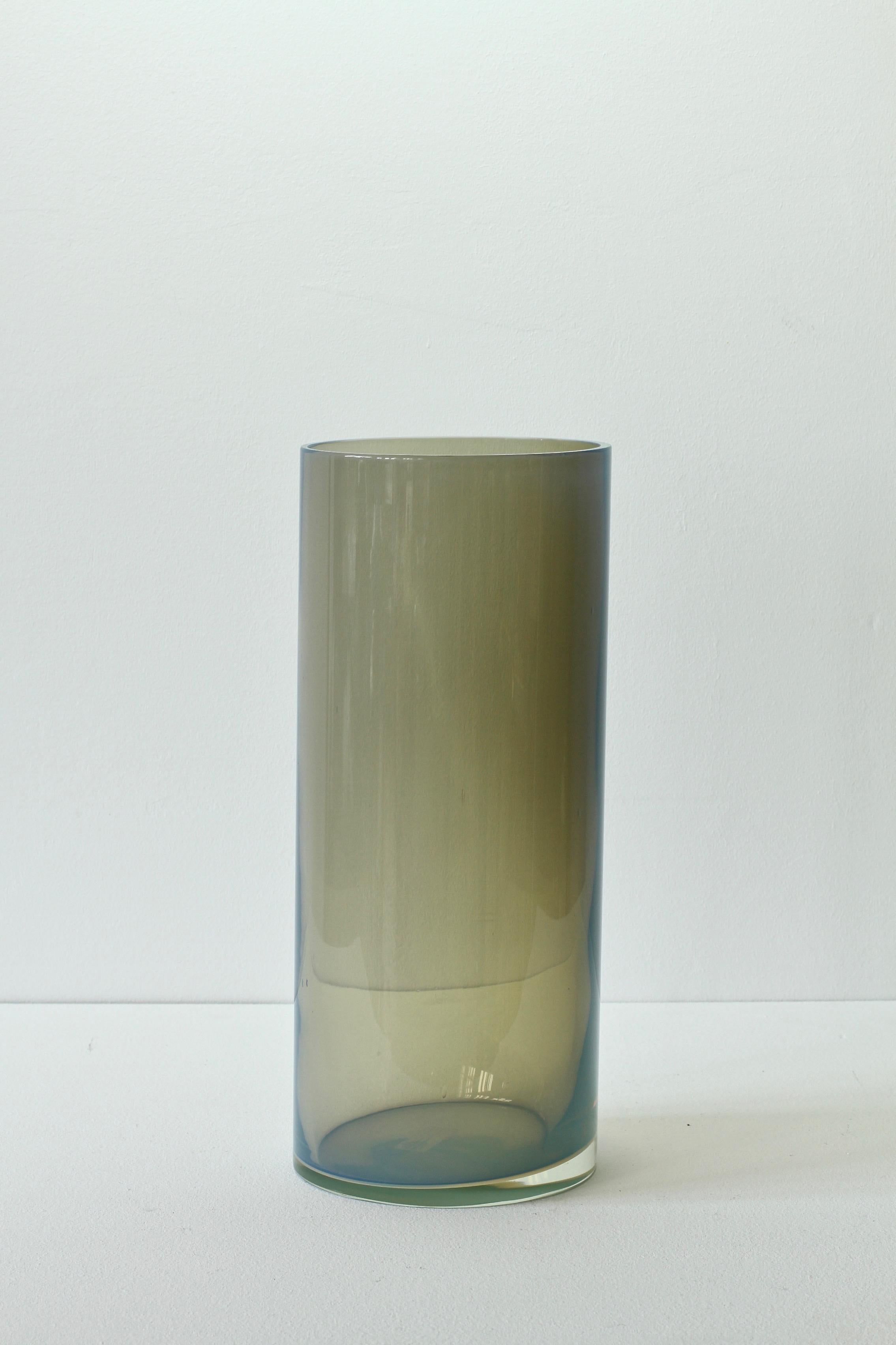 Tall midcentury, vintage Italian translucent smoked toned 'Opalino' Murano glass vase designed by Antonio da Ros for Cenedese, circa 1970-1990 Wonderful translucent color (color) of moss green smoked dark toned glass. Simplistic yet elegant form