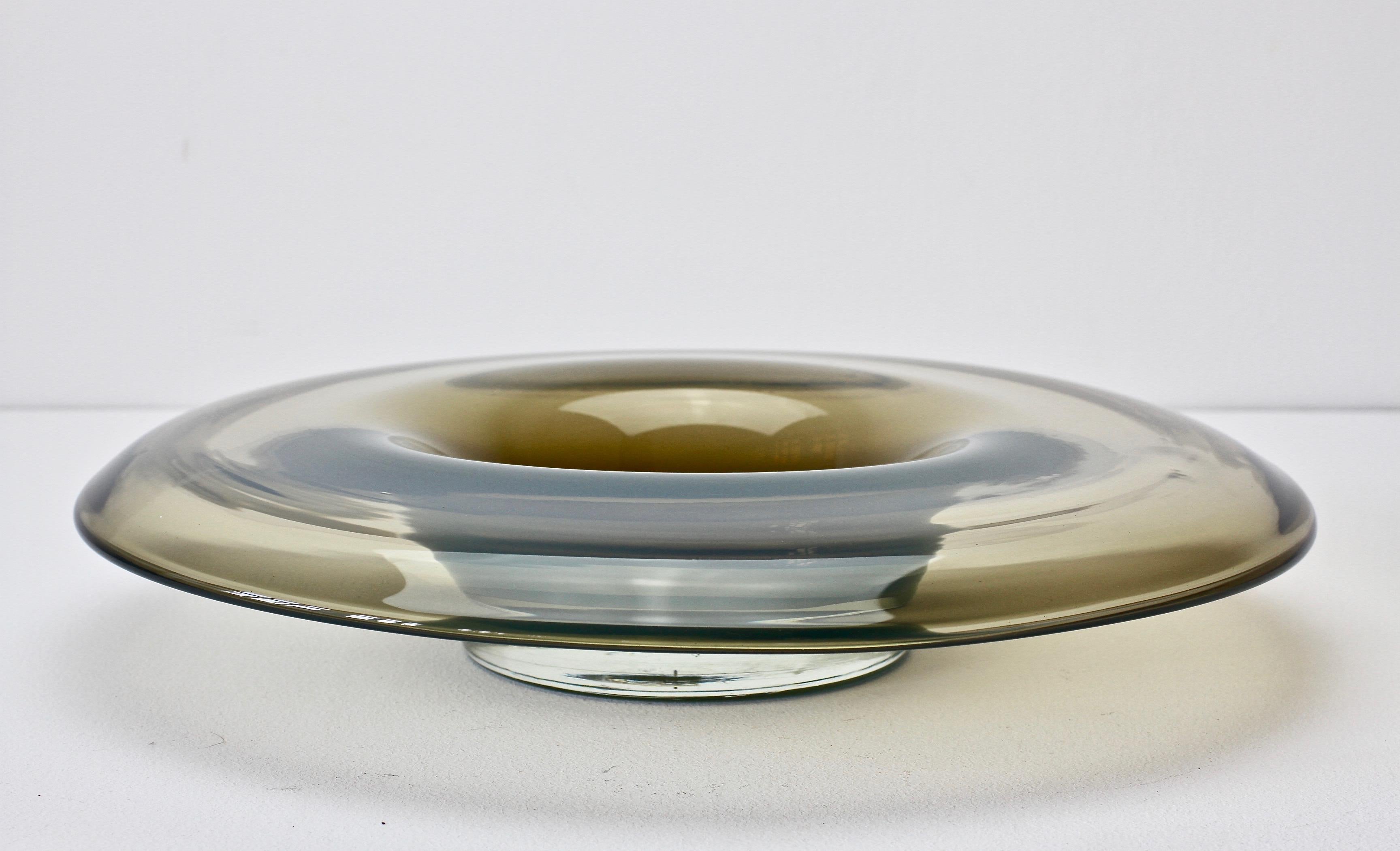 Italian Murano glass 'Opalino' serving or dipping bowl by Antonio da Ros for Cenedese, Italy, circa 1970-1990. Wonderful translucent color of smoked grey. Simplistic yet elegant form - almost futuristic. Very fun to dine with this rare piece of