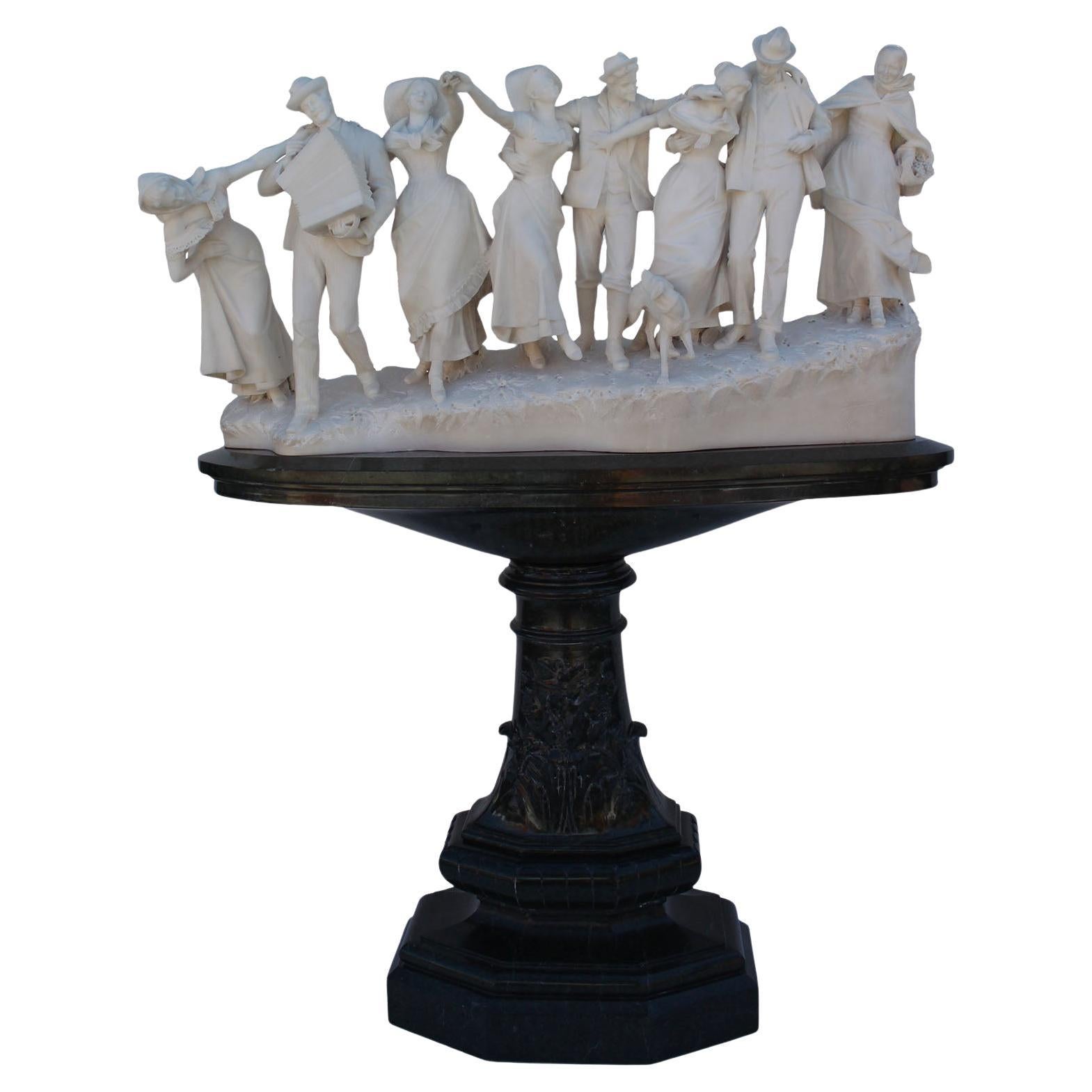Antonio Garella (italiano, 1863-1919) Scultura in marmo "La festa del villaggio" in vendita