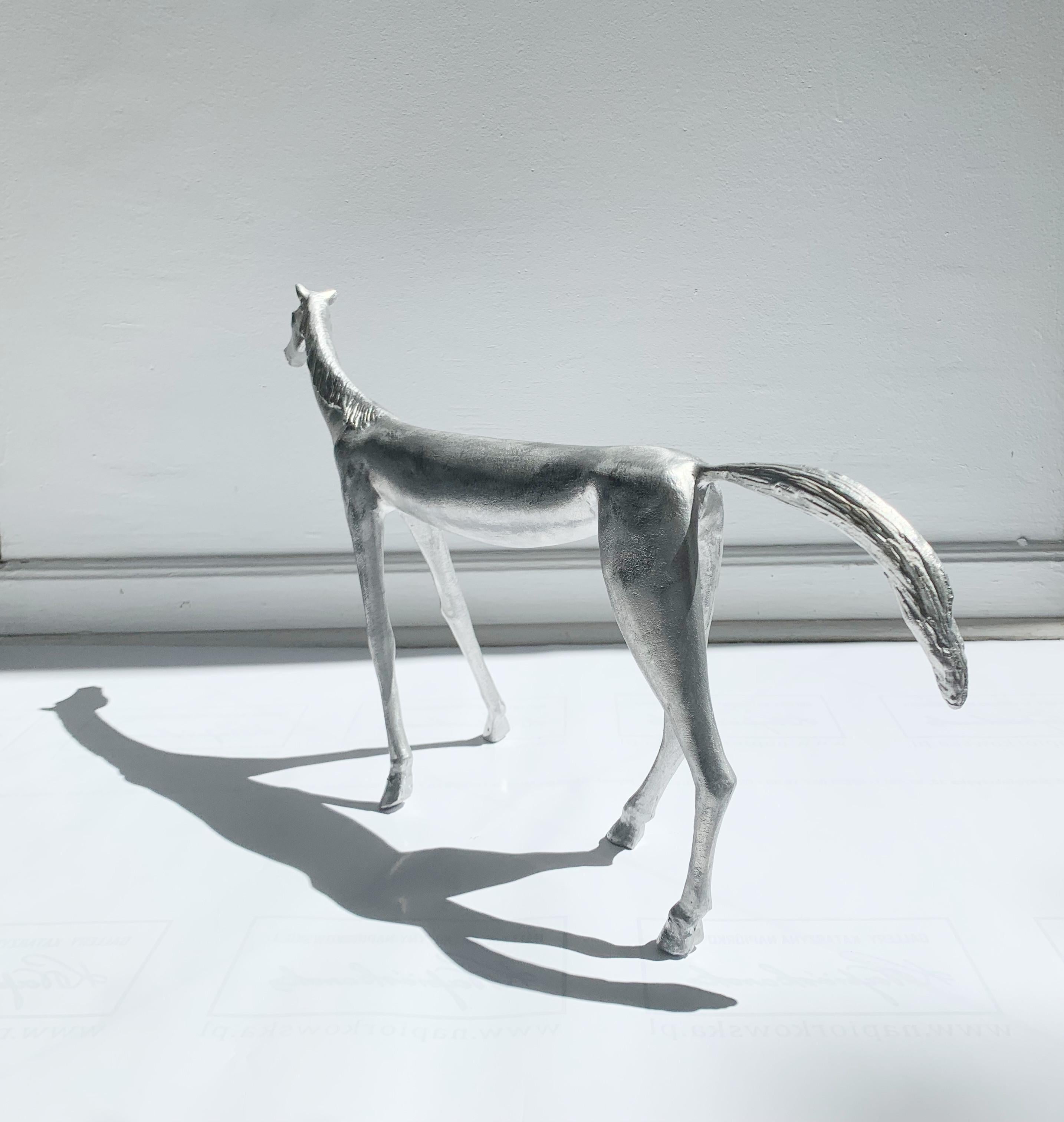 Contemporary figurative aluminium sculpture by Italian artist Antonio Giancaterino. Sculpture depicts a horse shown in artistic proportions. 

ANTONIO GIANCATERINO
He graduated in 1972 from the Academy of Fine Arts in Venice. He received the award