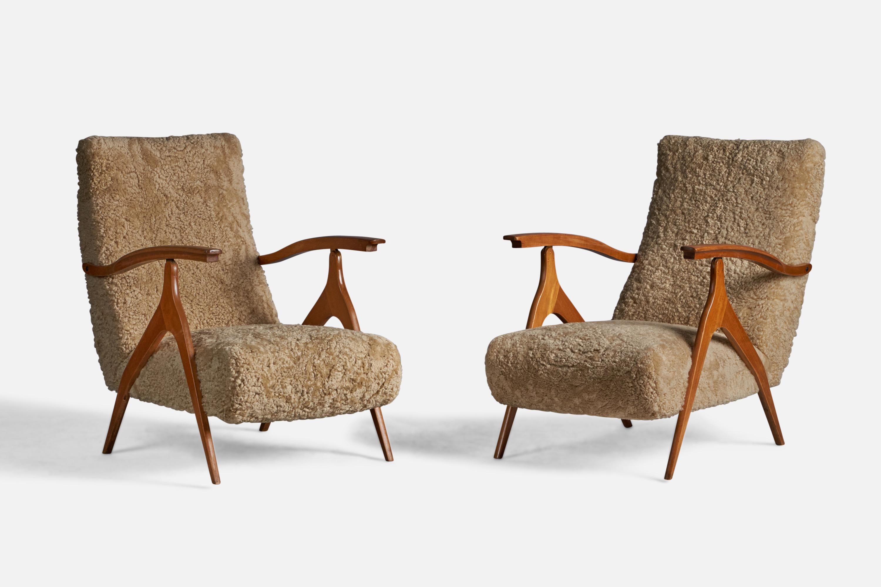 A pair of wood and shearling lounge chairs, designed and produced by Antonio Gorgone, Italy, 1950s.

14