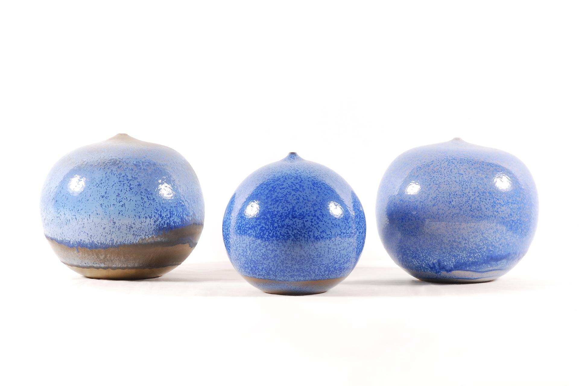 Spherical sculptures by the Belgian ceramist Antonio Lampecco.
Round Ceramic with crystallized enamel and a tiny aperture removing any function to the object.
Humble, Lampecco didn't consider himself as an artist, but obviously he was one of them