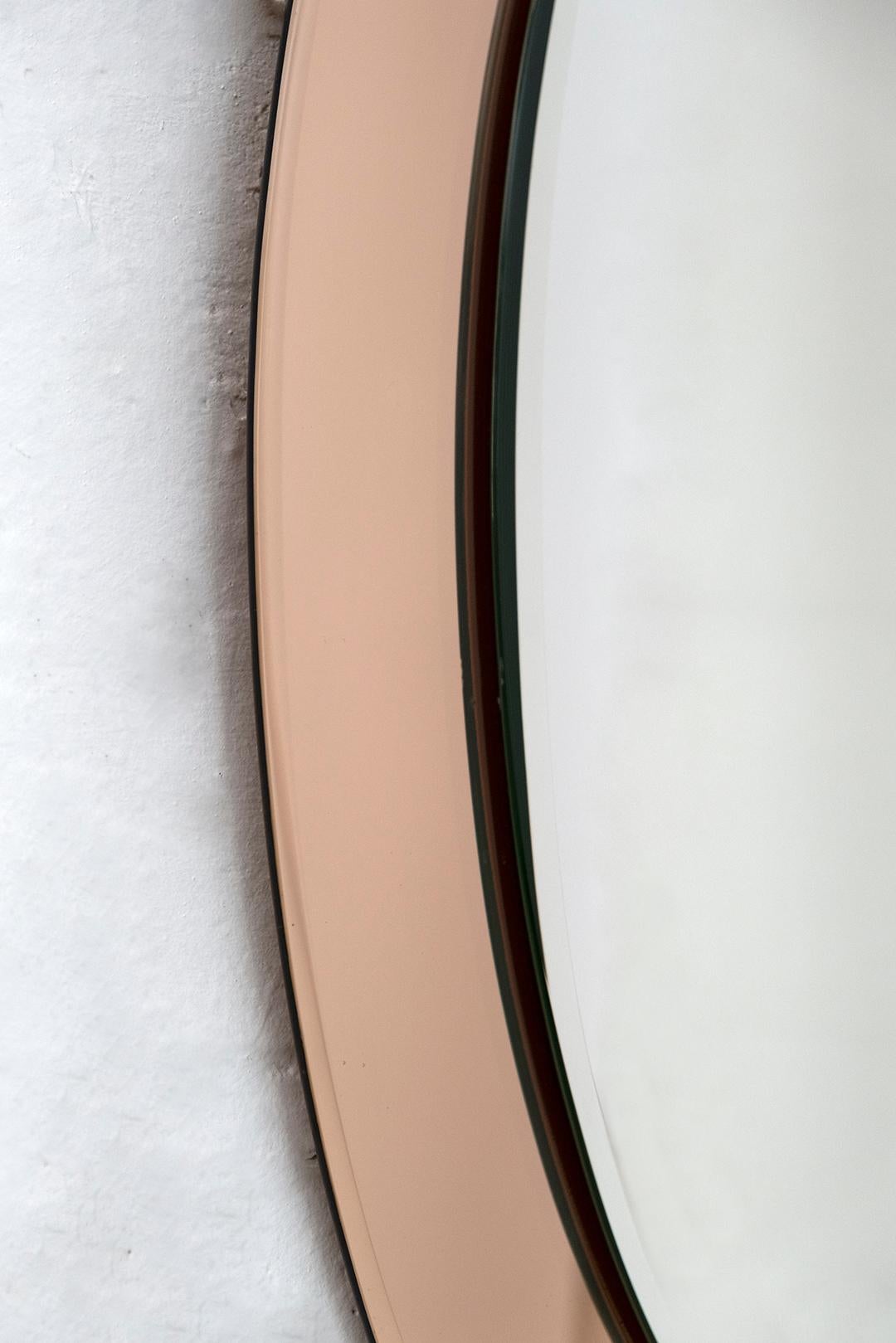 This mirror was designed and produced by Antonio Lupi for Cristal Luxor.
As shown in the photo, it has two scratches on the surrounding frame, in the upper part.

Antonio Lupi was born in Vinci in Italy in 1932 and at the age of 18 he began the