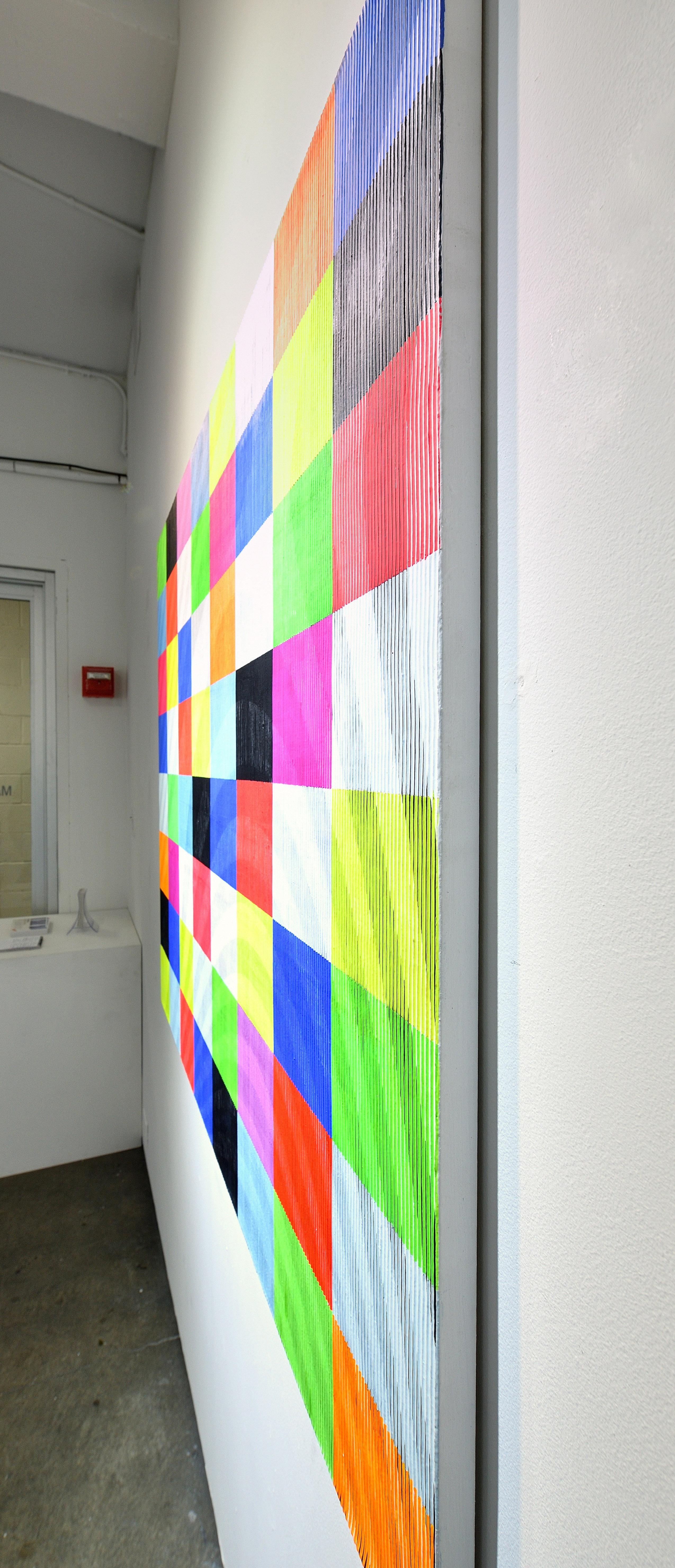 Multi-colour, op art.  Three artworks in one painting, where the artworks changes when you walk from left to right. One side are black and white linear forms; the other is multi-colour geometric squares. 
Antonio Marra’s 3D paintings are