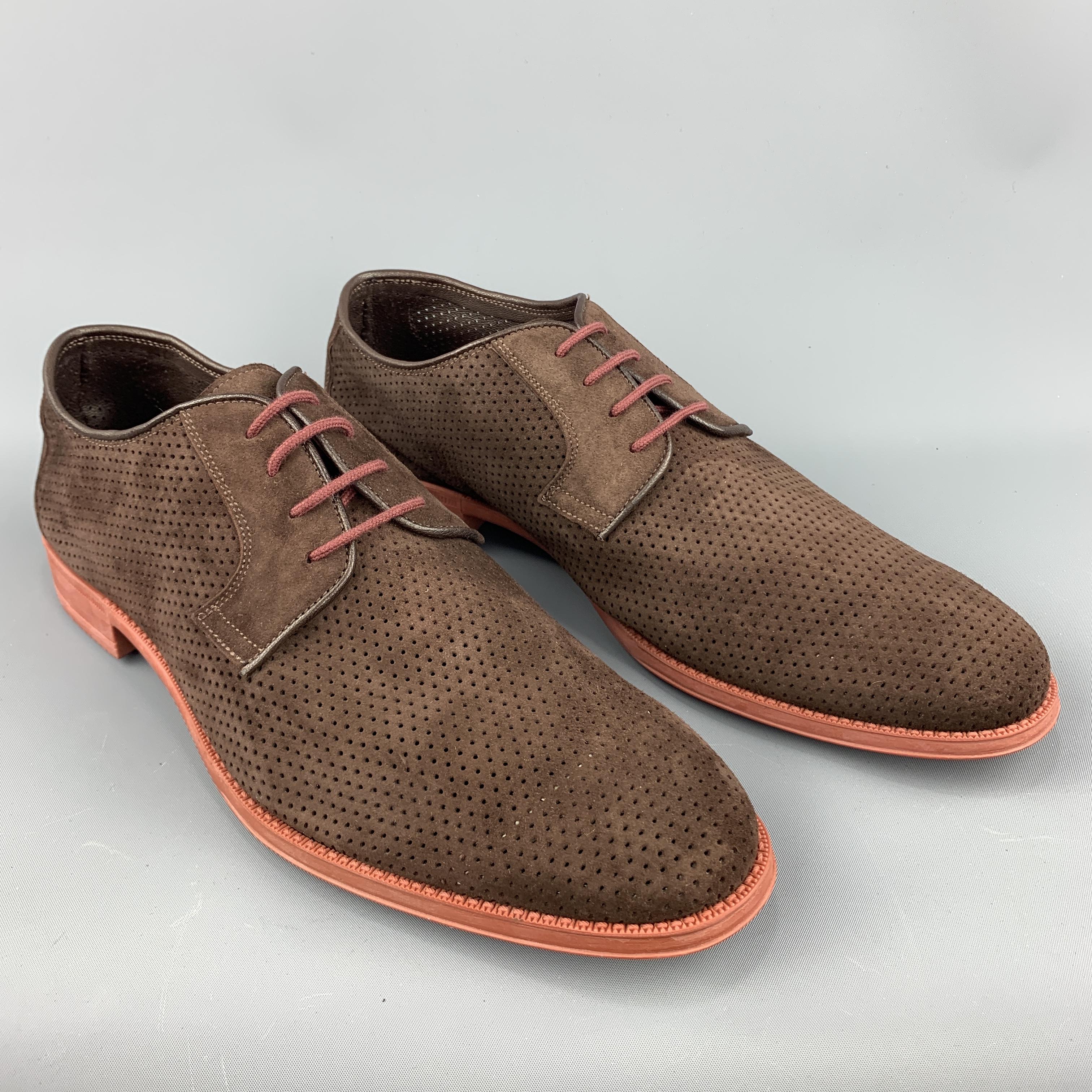 ANTONIO MAURIZI derbys come in brown perforated suede with a rubber sole. With box. Made in Italy.
 
Excellent Pre-Owned Condition.
Marked: IT 46
 
Outsole: 12.5 x  4.25 in.