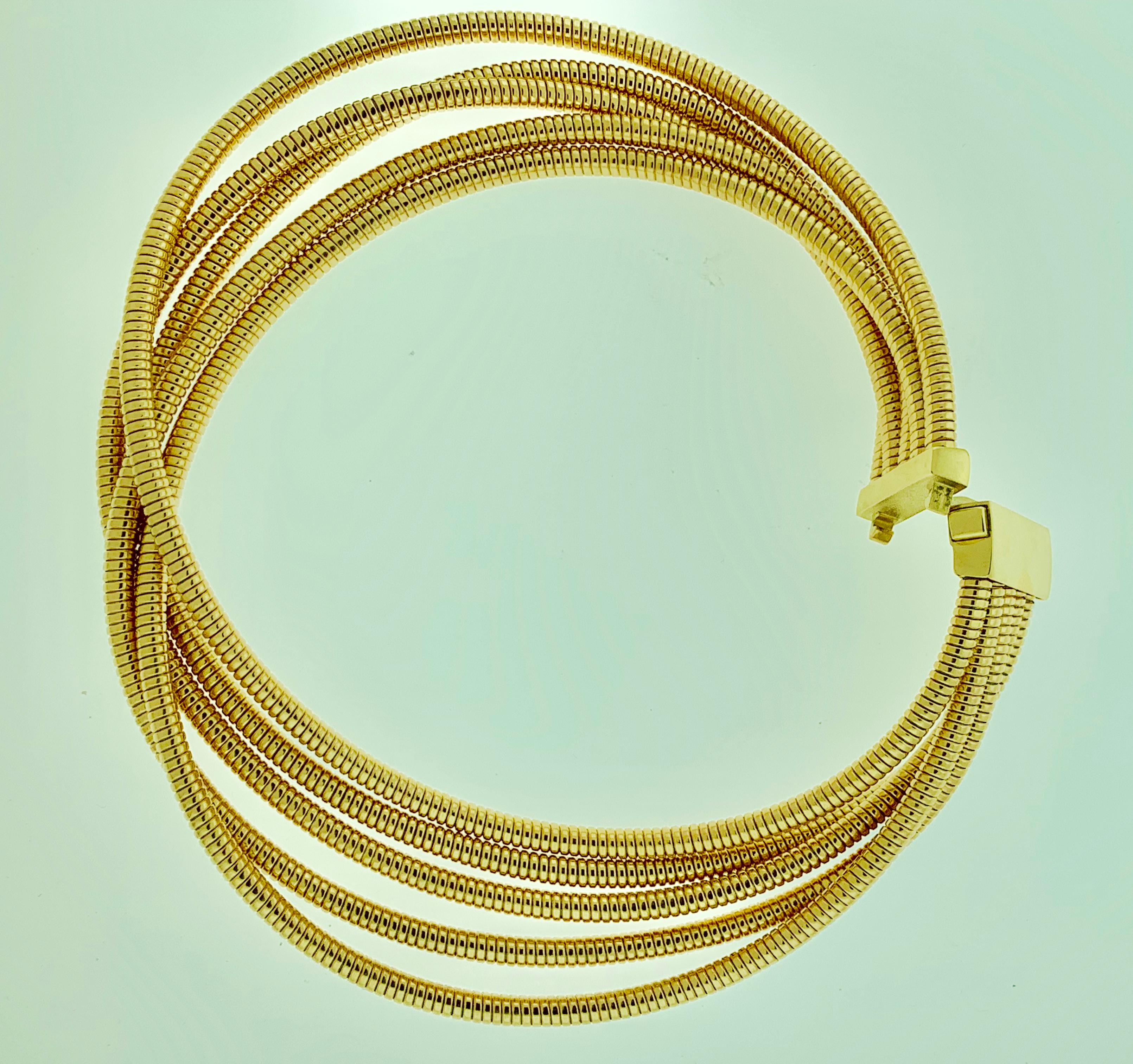 DNA Spring Wire 5  strand Collar Necklace is an innovation in contemporary couture. 
Classic gold chains, big, yellow, pink. And, maybe, diamonds and ebony: Antonio Papini is a company that has taken the half a century old and has grown a bit out