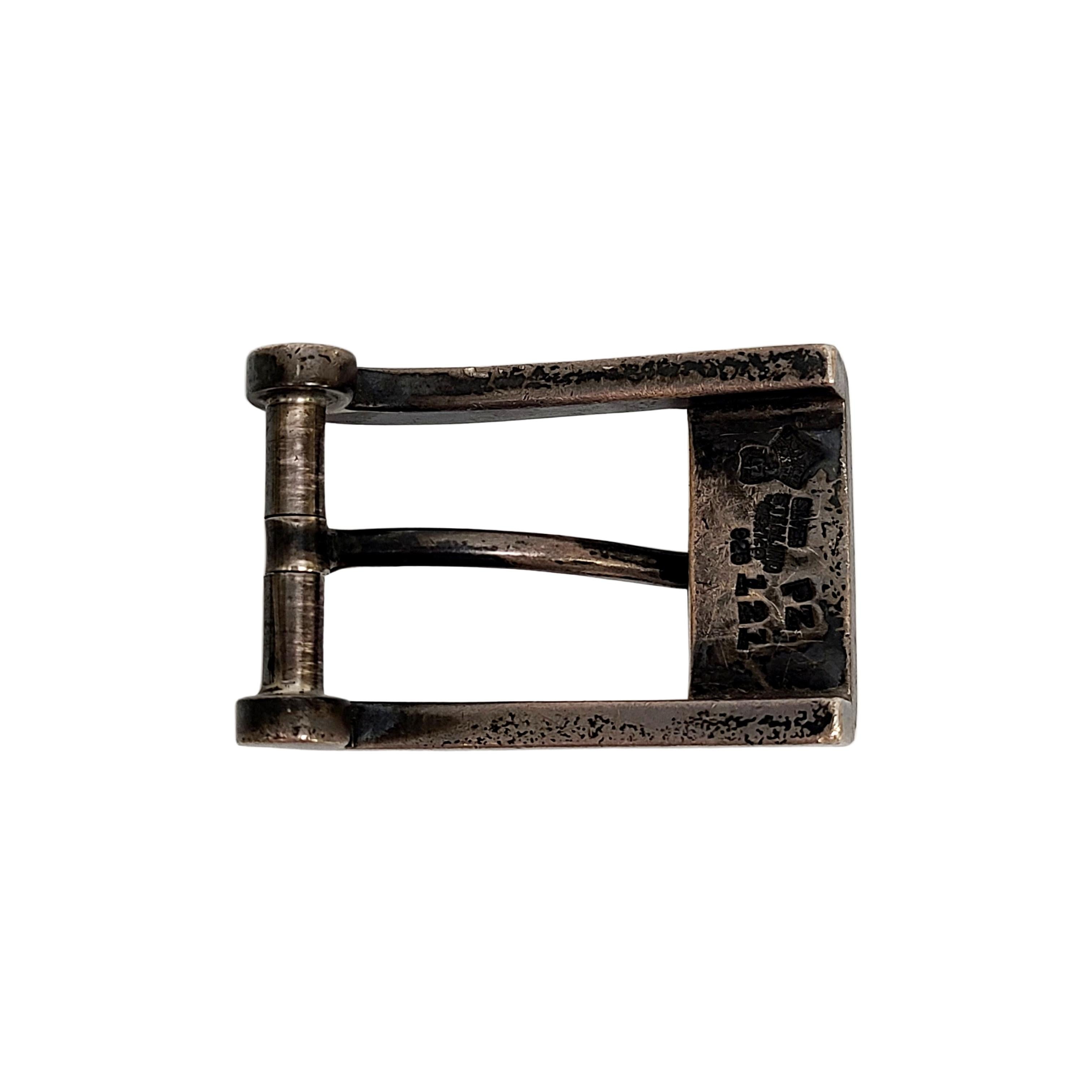 Taxco, Mexico sterling silver belt buckle by Antonio Pineda.

Renowned master silversmith, Antonio Pineda, created this simple and classic belt buckle.

Measures 2