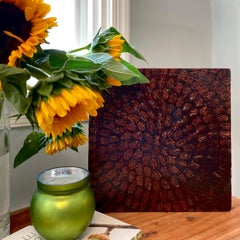 Centered: abstract painting on canvas, dark earth tones & gold w/ circle mandala