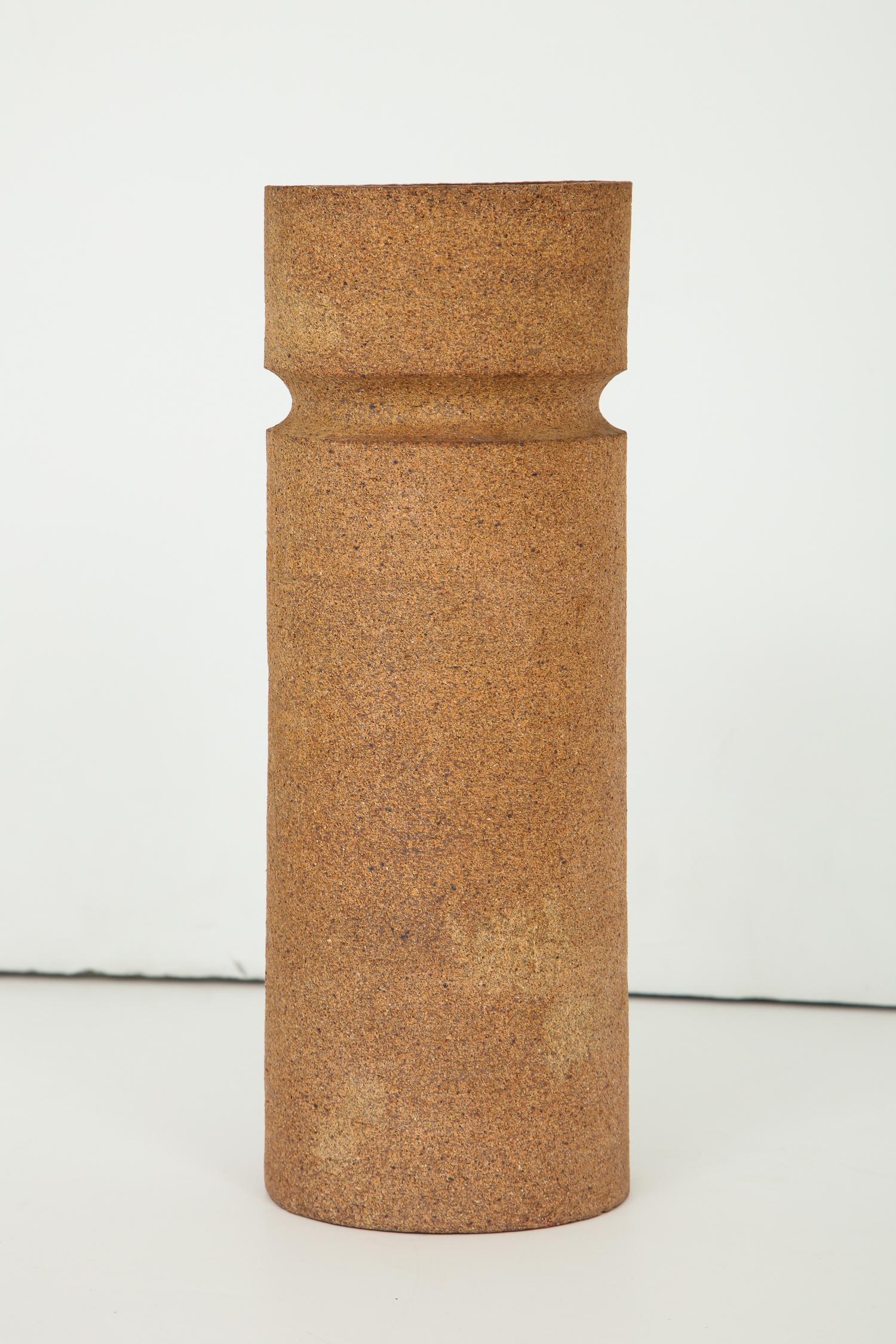 Architectonic cylindrical vessel with incised ledge, unglazed outside, partially glazed inside, by Madrid ceramic artist Antonio Salvador Orodea, principal of the ASO factory. Part of a collection associated with the 1964-1965 World’s Fair in