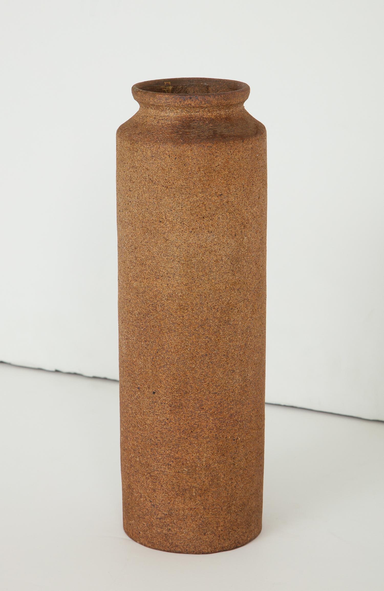 Architectonic cylindrical vessel with tapering rim by Madrid ceramic artist Antonio Salvador Orodea, principal of the ASO factory. Part of a collection associated with the 1964-1965 Wold’s Fair in Flushing Meadows, for which Orodea provided