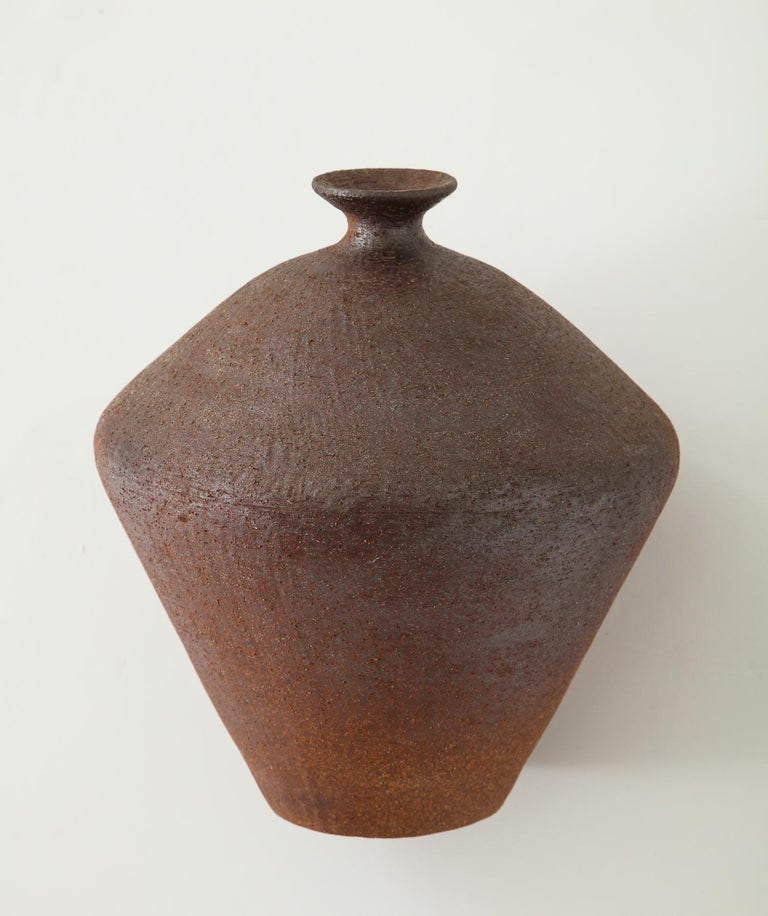 Bulbous stoneware vessel with narrow spout by Madrid ceramic artist Antonio Salvador Orodea, principal of the ASO factory. Part of a collection associated with the 1964/65 Wold’s Fair in Flushing Meadows, for which Orodea provided concentric ring