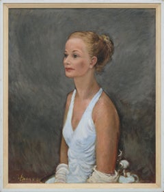 Portrait d'une femme en robe blanche