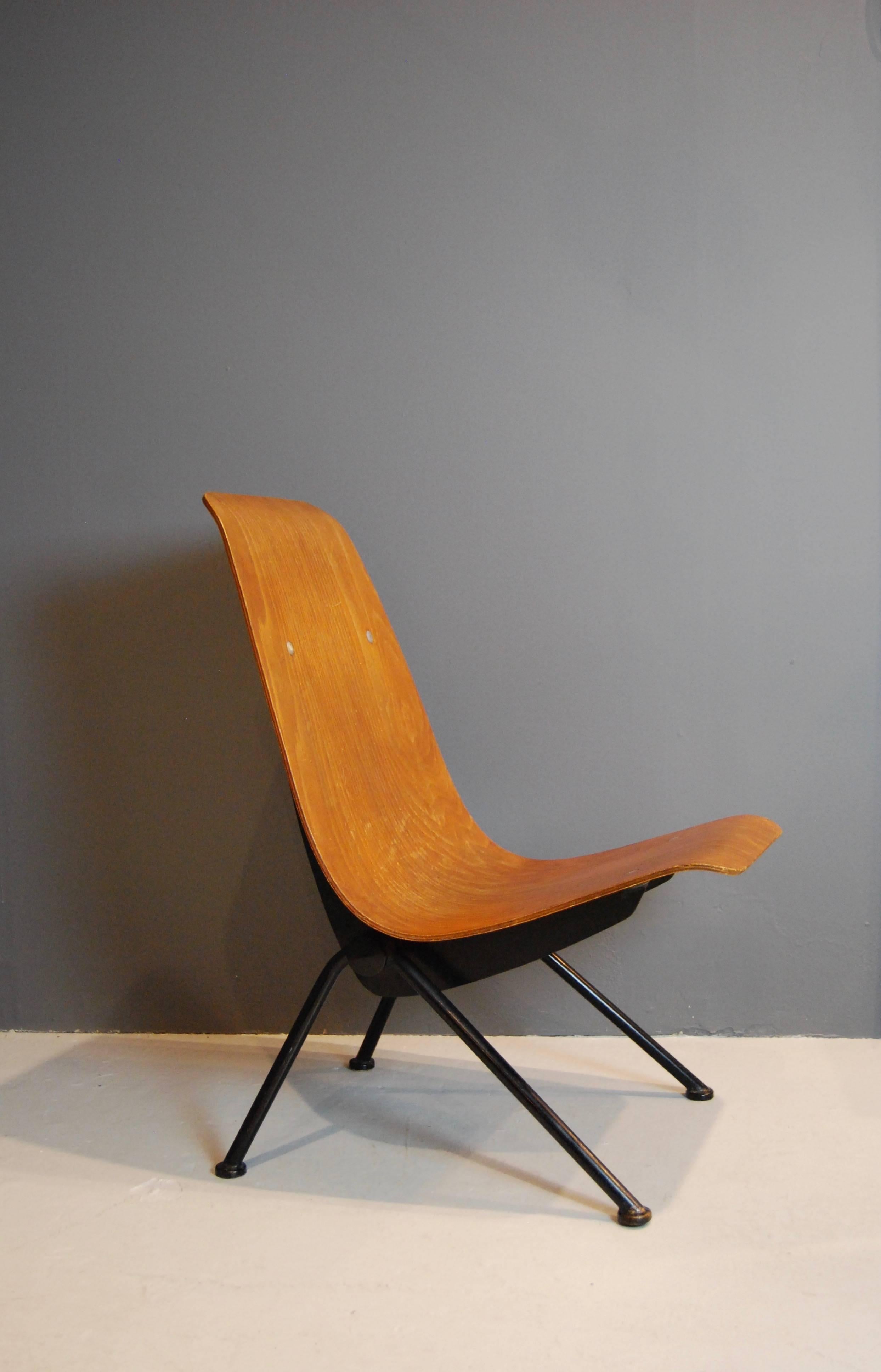 Antony chair, designed in 1954 by Jean Prouve and produced by Atelier Prouve.
Molded beech plywood, enameled steel, aluminium.
This chair is in great original condition, showing signs of wear and beautiful patina.
 