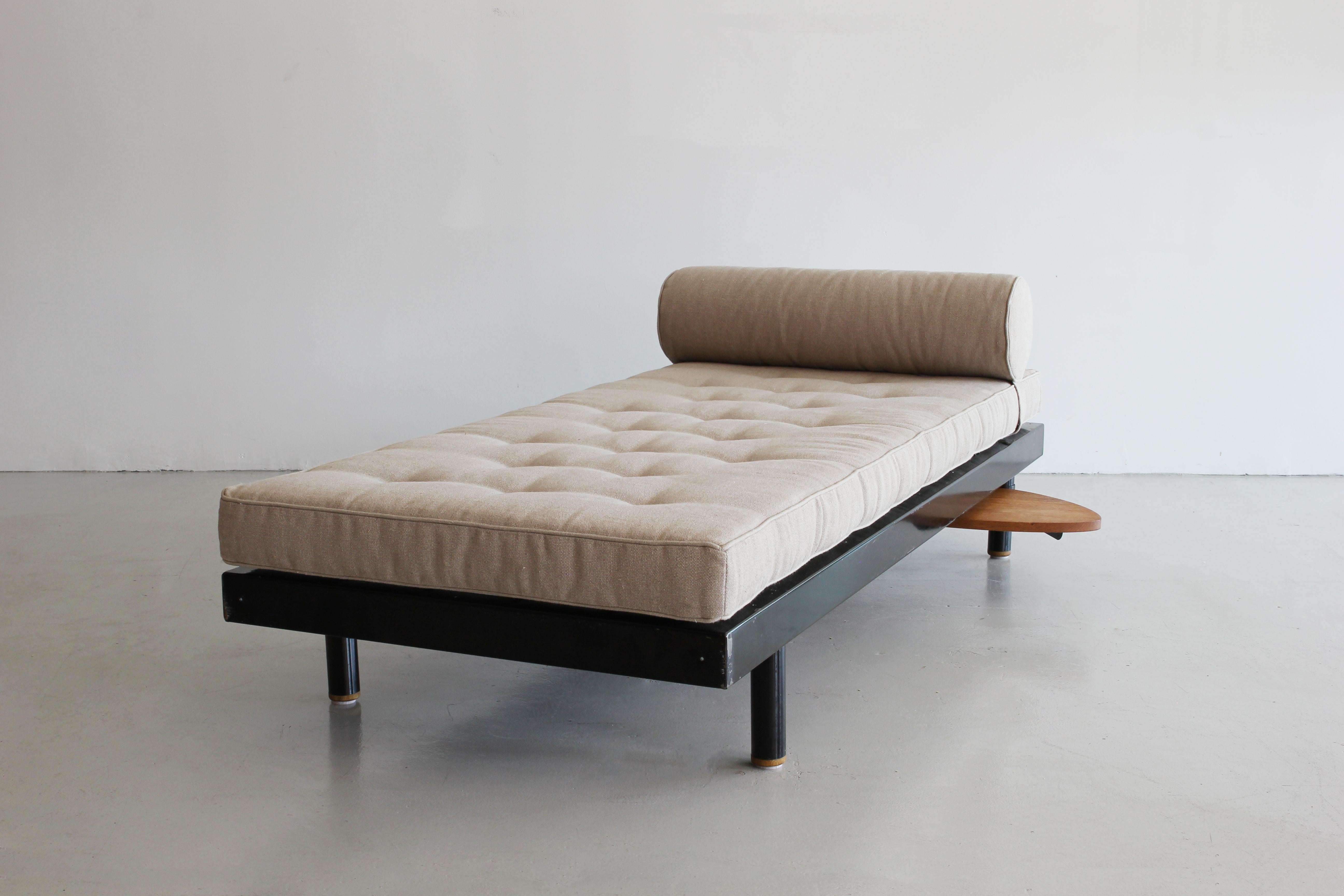 S.C.A.L. Antony daybed with pivoting table designed by Jean Prouvé and Charlotte Perriand. Manufactured by Ateliers Prouvé, France, circa 1952.
