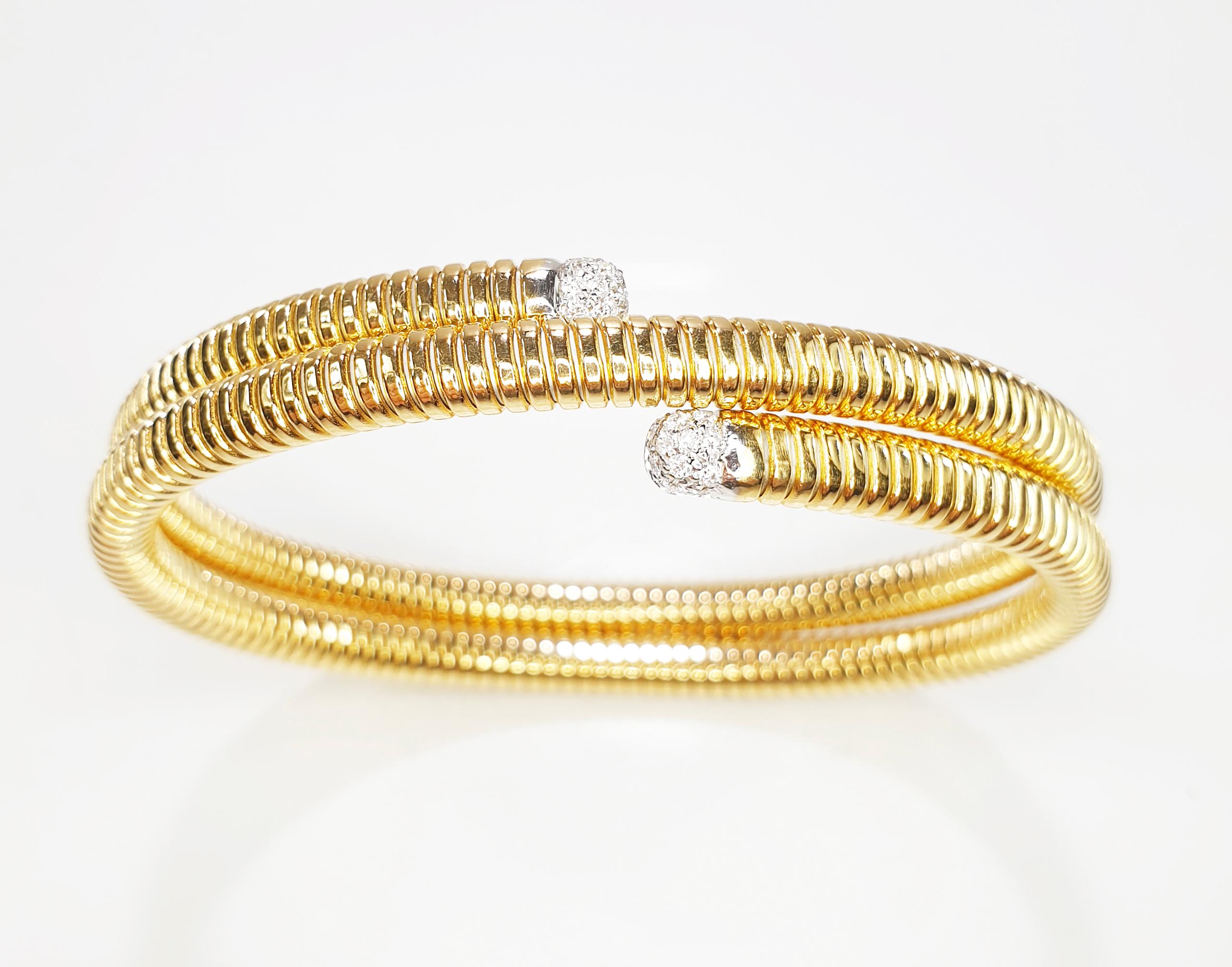 Flexible and adaptable bracelet with tubogas craftmanship that fits medium to large sizes.
Available in three colours of gold, yellow, white and rose.
17,60gr and 0.25Carat Diamonds
Request availability if in stock 5 days handling time
If not in