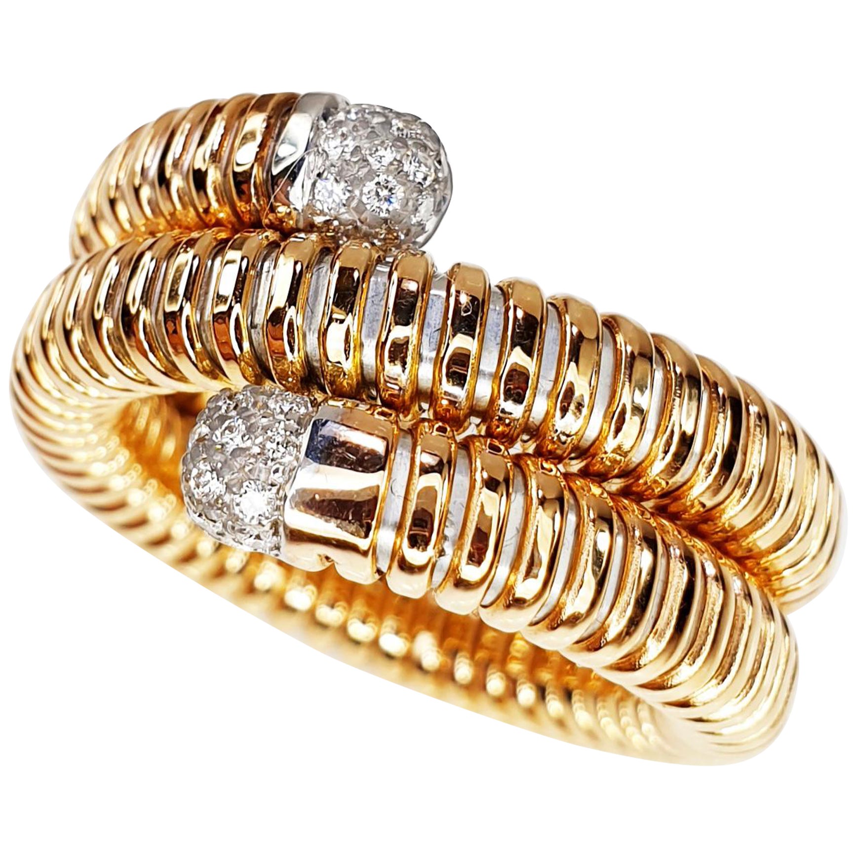 Flexible and adaptable ring with tubogas craftmanship that fits medium to large sizes.
Available in three colours of gold, yellow, white and rose. This listing is applicable to the  white  option. 
11,40gr and 0.25Carat Diamonds
Request availability