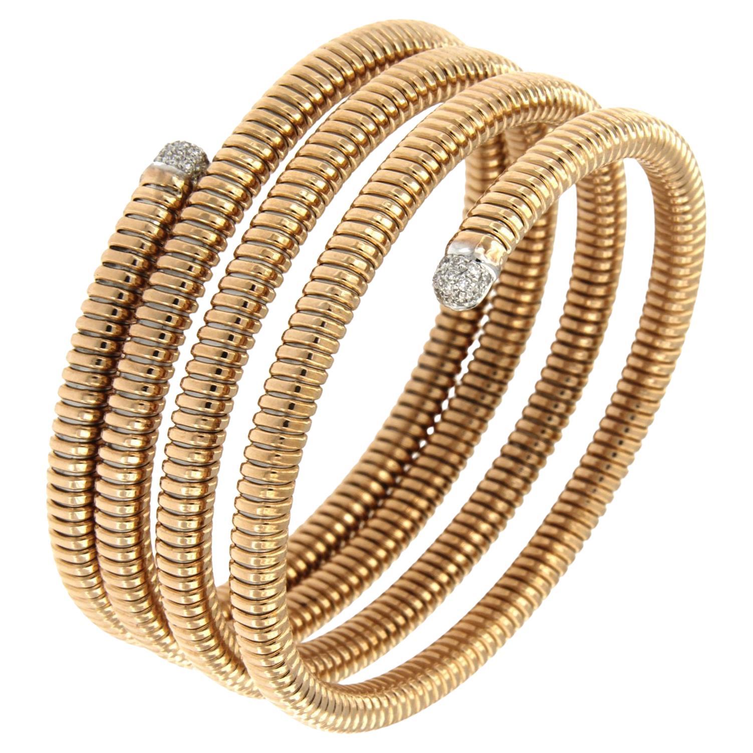 Flexible and adaptable bracelet with tubogas craftmanship that fits medium to large sizes.
5 twists
Available in three colours of gold, yellow, white and rose.
34,50gr and 0.30Carat Diamonds
Request availability if in stock 5 days handling time
If