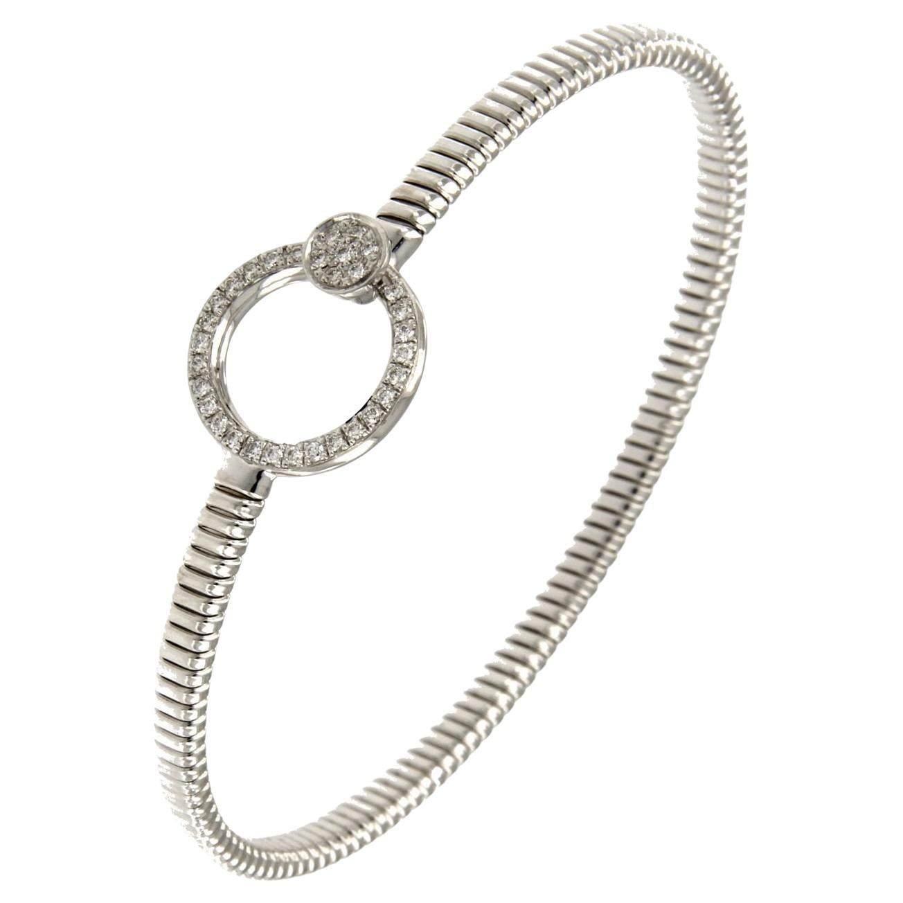 Pulsera flexible y adaptable con tubogas artesanales que 
se ajusta a muñecas de 7,87 pulgadas de medianas a grandes
Disponible en tres colores de oro, amarillo, blanco y rosa.
Oro peso 9,60GR y Diamantes 0,33Carat
El vídeo es de una pulsera similar