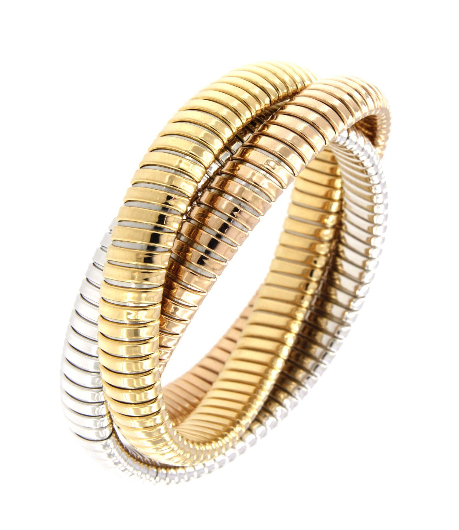 Flexible and adaptable bracelet with tubogas craftmanship and a with a  twist of classic modern design. 
 Made to order that fits medium to large sizes.
Available in three colours of gold, yellow, white and rose. 
Gold weight 33,00gr  - 
also