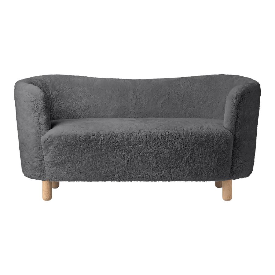 Antrachite Sheepskin and natural oak mingle sofa by Lassen
Dimensions: w 154 x d 68 x h 74 cm 
Materials: Sheepskin, Oak.

The Mingle sofa was designed in 1935 by architect Flemming Lassen (1902-1984) and was presented at The Copenhagen