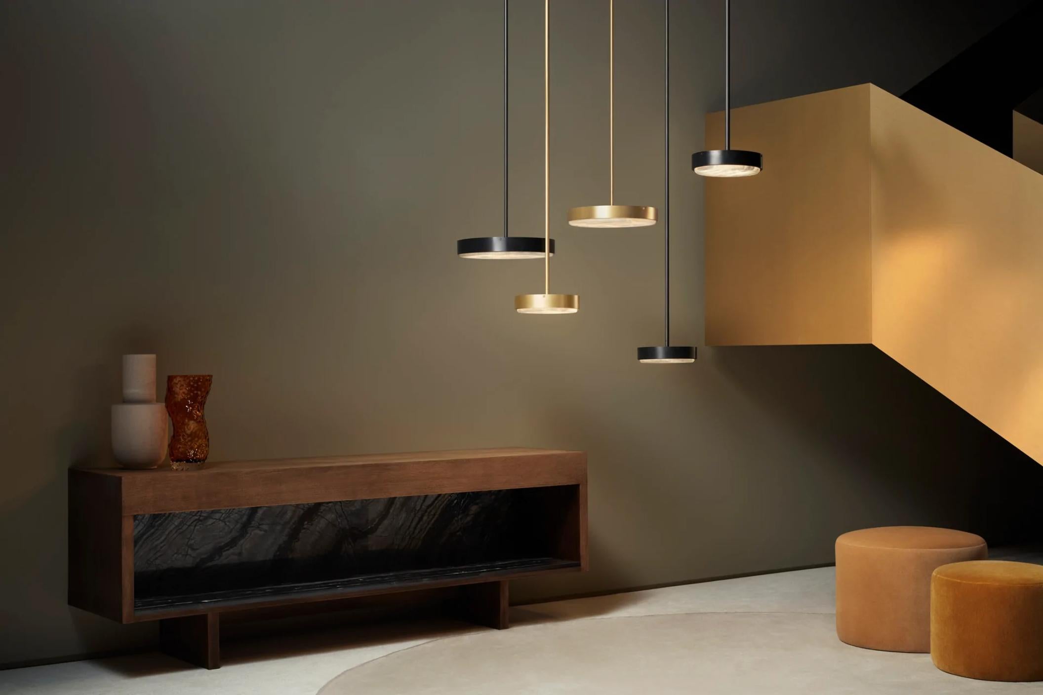 Anvers large pendant by CTO lighting.
Materials: satin brass with alabaster stone
Also available in bronze with alabaster stone
Dimensions: H 6.8 x W 54.5 cm 

All our lamps can be wired according to each country. If sold to the USA it will be