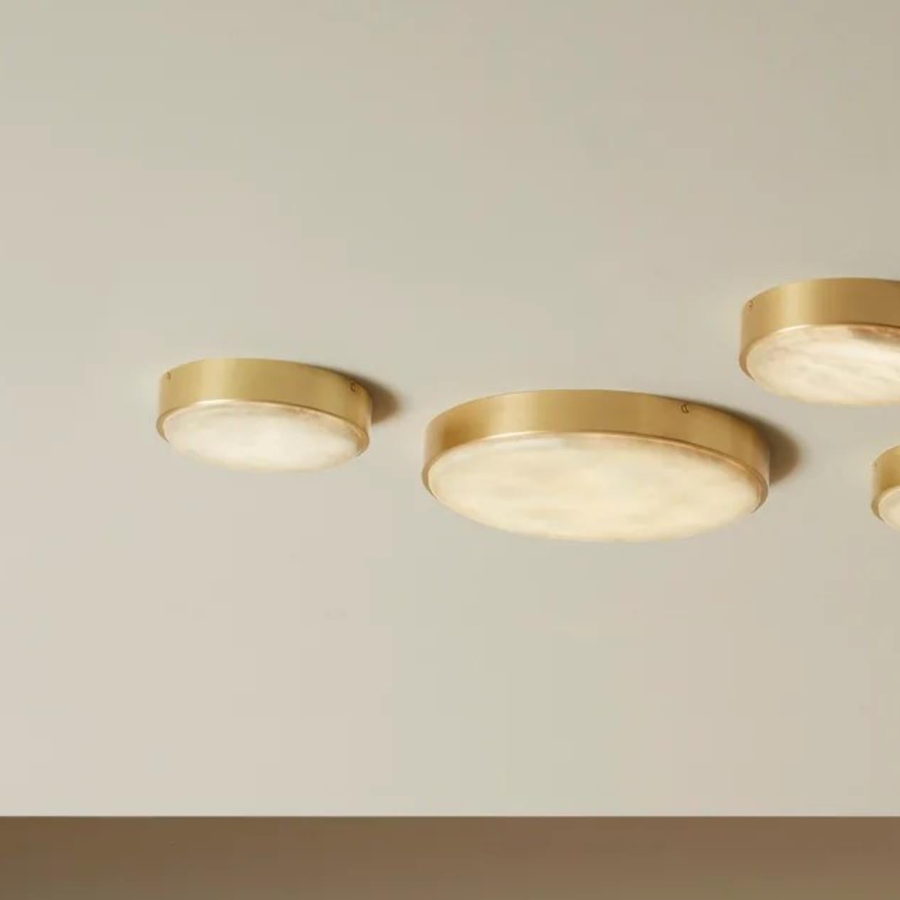 Anvers Large Wall/Ceiling lamp by CTO Lighting
Materials: satin brass with alabaster stone
Also available in bronze with alabaster stone
Dimensions: H 4.8 x W 54.5 cm 

All our lamps can be wired according to each country. If sold to the USA it will