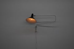 Anvia riedita la lampada da parete 'The Paper Clip' in bianco e nero