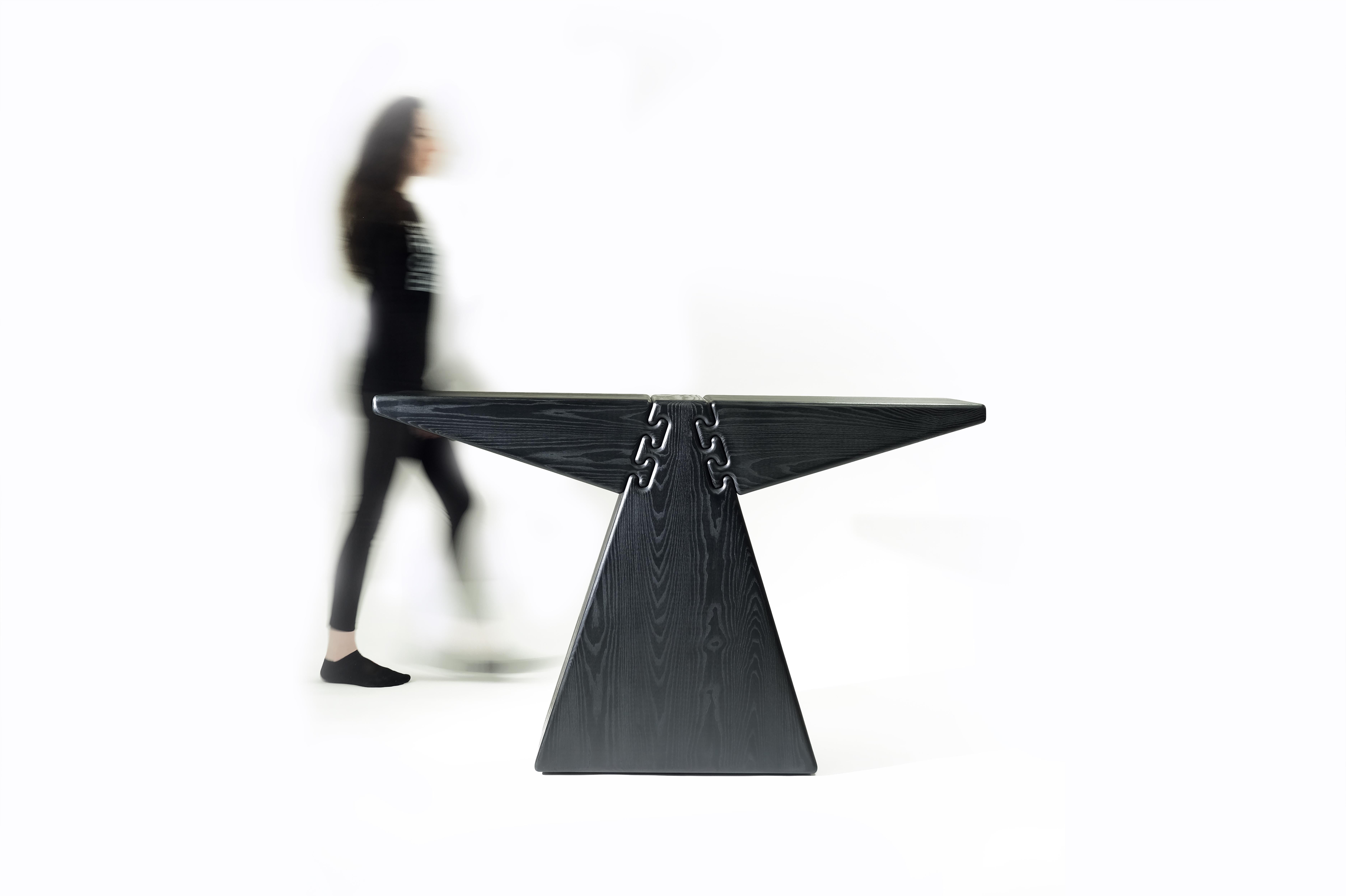 Anvil is composed of geometric shapes, extruded from abstract planes into solid forms. The joinery is simple and transparent. Rounded edges soften sharp angles, enhancing the whimsical spirit of the piece.

Anvil is part of Erika's first furniture