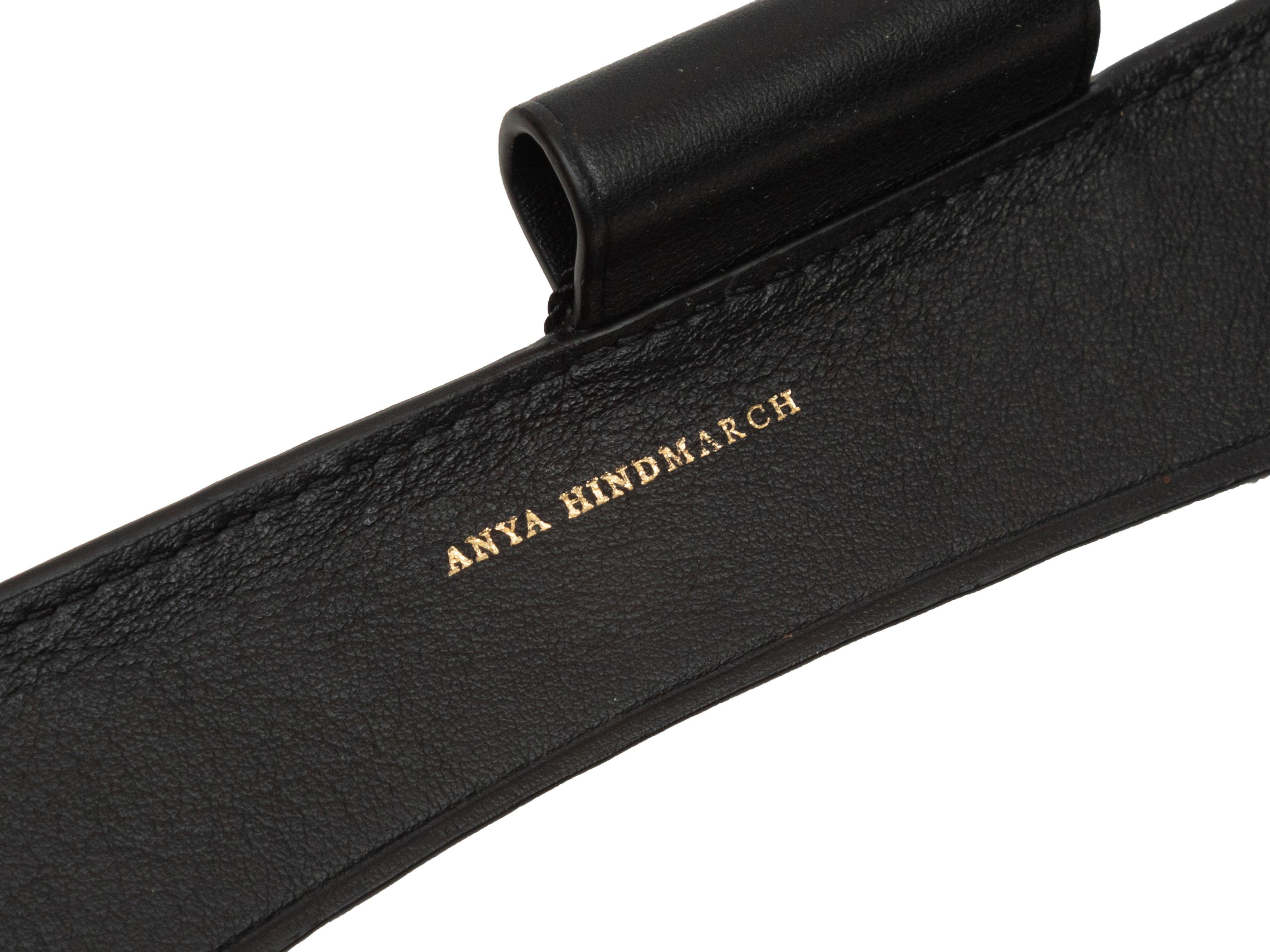 Product Details: Black leather allover sticker print journal with pen by Anya Hindmarch. 9