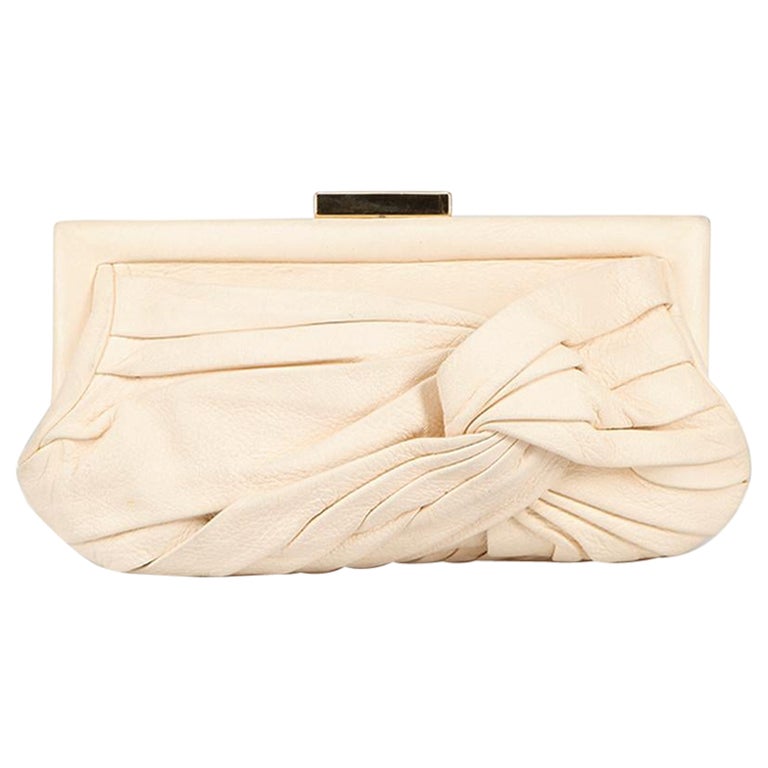 Anya Hindmarch Pochette con cornice a nodi in pelle color crema