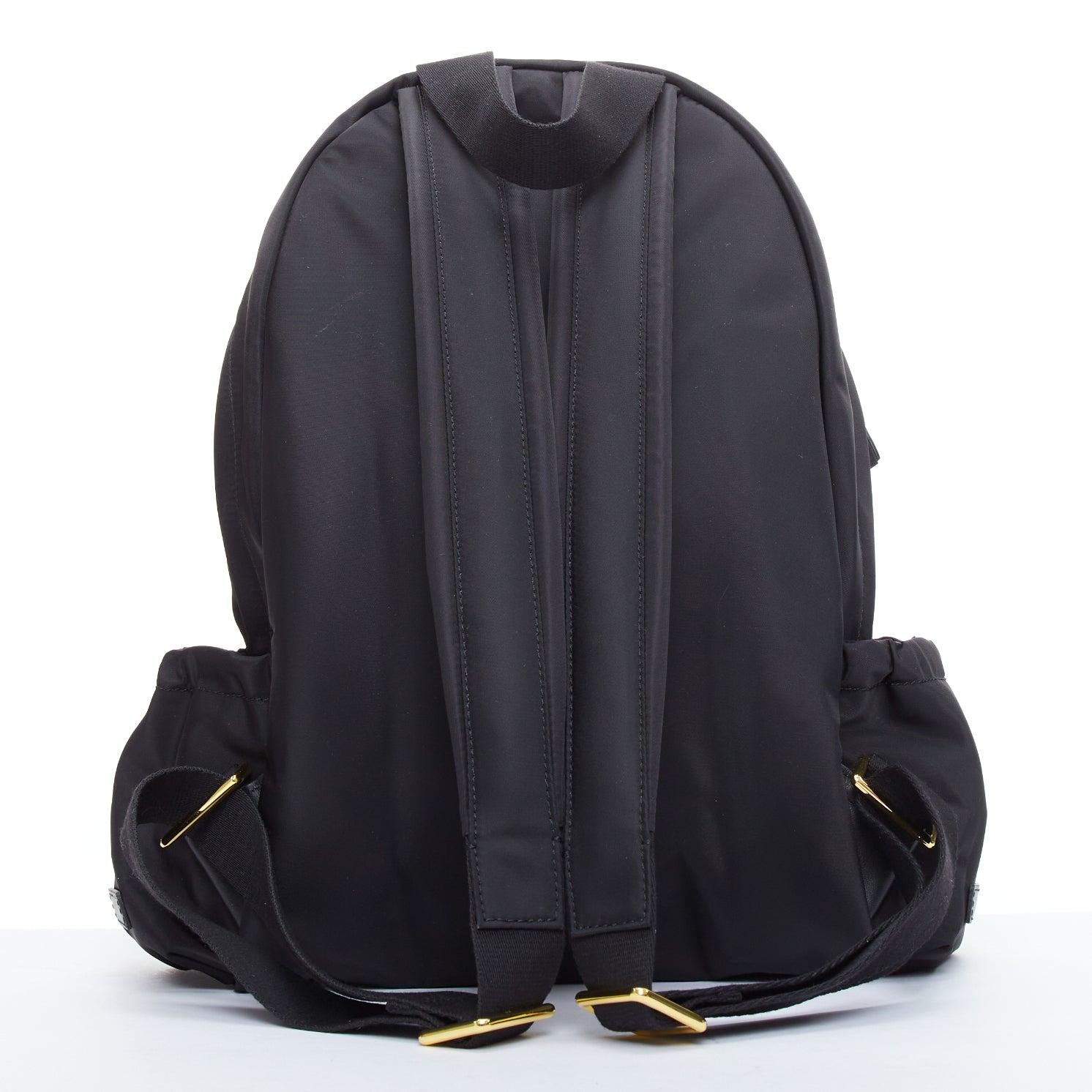 ANYA HINDMARCH Cycling black leather trim multi pocket shell backpack bag In New Condition For Sale In Hong Kong, NT