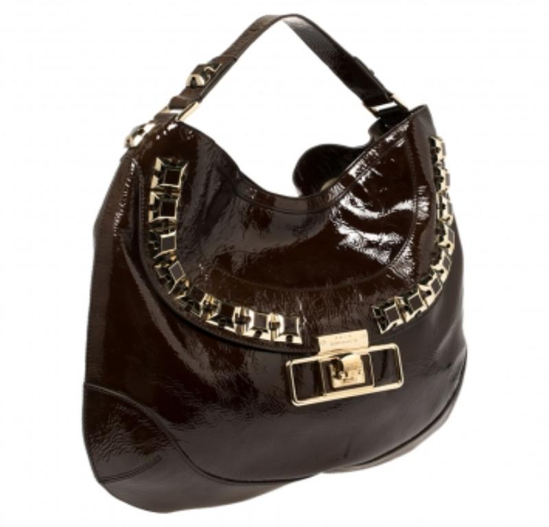 Diese Hobo von Anya Hindmarch ist aus Lackleder gefertigt und mit goldfarbenen Metalldetails und hoher handwerklicher Sorgfalt versehen, um Ihnen eine lange Lebensdauer zu garantieren. Das geräumige Innere der Tasche ist mit Wildleder gefüttert, und