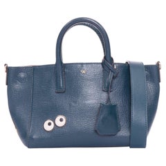 Bolso de hombro tipo mini satchel de ANYA HINDMARCH en color verde azulado Ebury, de piel granulada azul marino