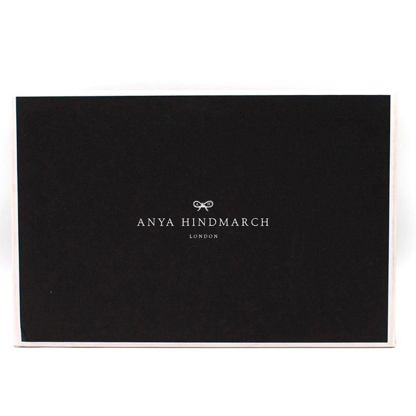 Anya Hindmarch Georgiana Leather-appliqued Suede Clutch

- Clutch
- Suede
- Leather
- Appliqued
- Tassels
- Zip fastening along top
- Gold-tone hardware
- Internal card slots
- Internal zip pocket
- Fully lined
- Comes boxed with all tags,