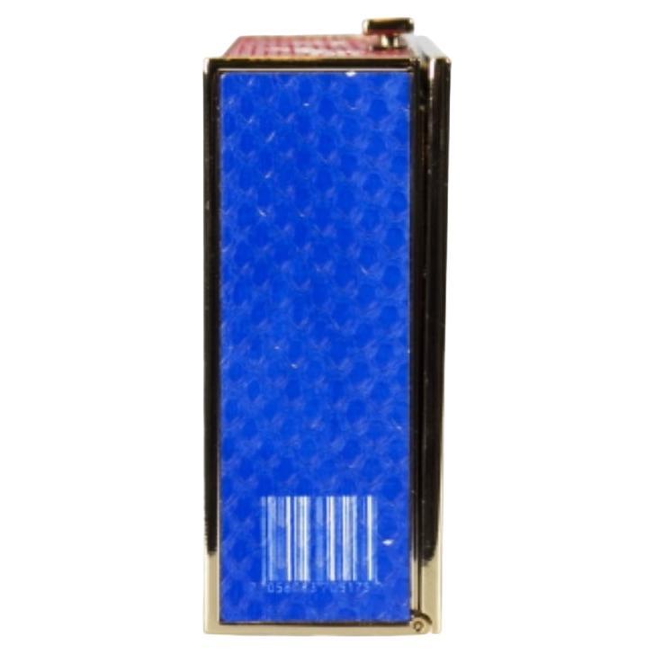 Anya Hindmarch's clutch is crafted from exotic snakeskin into a boxy shape. Flaunting red, blue and white hues, the exterior of the clutch is accented with 'Topps Bazooka Bubble Gum' print. It has tan suede-lined interior where you can keep your