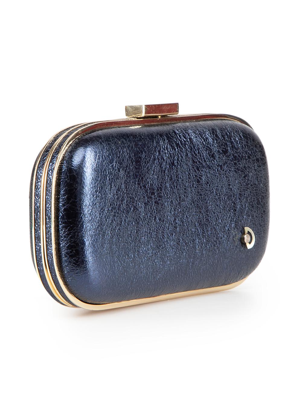 CONDITION is Good. Minor wear to clutch is evident. Light wear to the leather exterior with some cracking and abrasion of the surface coating in places. A number of very small scratches can also be found on the hardware components of this used Anya