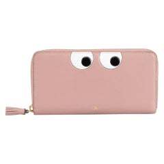 Anya Hindmarch Rosa Leder Augen Motiv Zip um Continental Brieftasche