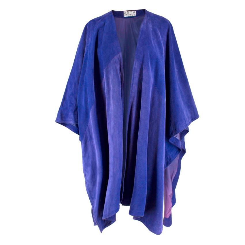 Anya Hindmarch Purple Suede Cape

- Purple suede cape
- Lined

Please note, these items are pre-owned and may show some signs of storage, even when unworn and unused. This is reflected within the significantly reduced price. Please refer to images