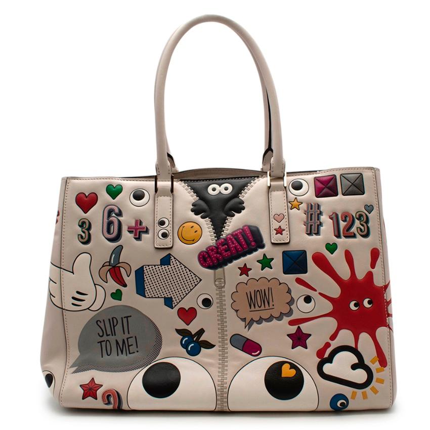 Anya Hindmarch White Leather Ebury Stickers Bag

- Made of soft leather 
- Fun stickers print 
- Top handles 
- Pale gold tone hardware 
- Logo to the front 
- Classic shape
- Interior zipped pocket
- Cheerful humorous design 

Materials:
leather