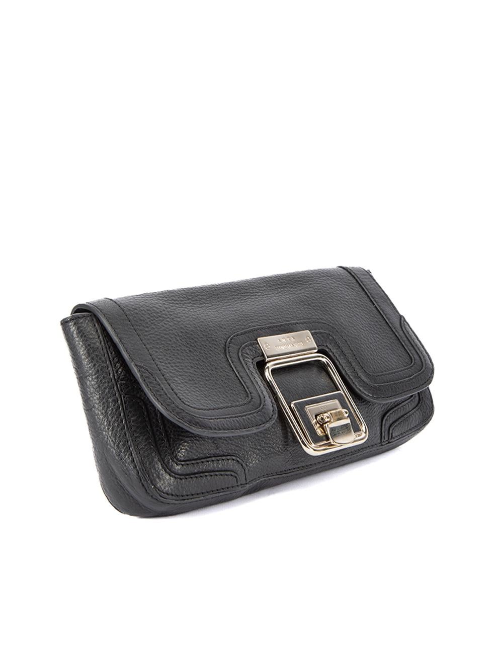 CONDITION is Very good. Minimal wear to clutch is evident. Minimal wear to the suede interior from general use and there is wear and scratches to the gold hardware on this used Anya Hindmarch designer resale item.   Details  Black Leather Rectangle