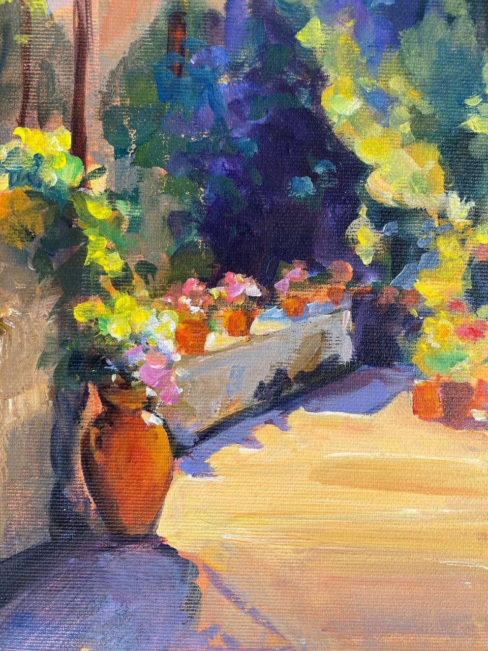 This painting takes us to a typical street in a Tuscan town, filled with warm sunlight and lush flower gardens. The soft shadows from the houses create a cozy atmosphere, while an orange cat resting behind a flower pot adds a special sense of