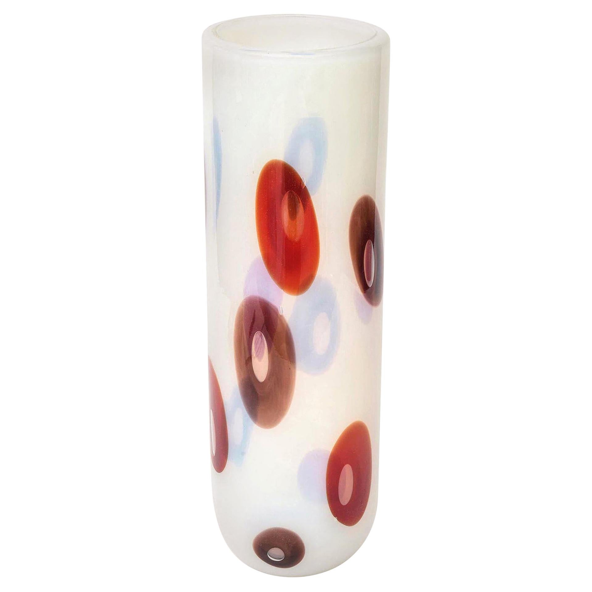 This absolutely stunning and rare Italian Murano opalescent glass vase by Anzolo Fuga for Avem has glorious applied murrines of colors of reds, browns with a purple hint. The original paper sticker is still intact as exemplified in the photos. The