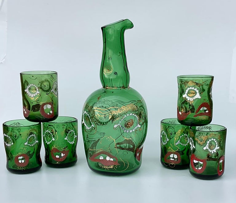 https://a.1stdibscdn.com/anzolo-fuga-murano-art-glass-set-of-glasses-and-pitcher-grotesque-faces-enamel-for-sale-picture-2/f_66412/f_339426421682196152938/8316B0E3_A133_4305_96FA_521241C348EA_master.jpeg?width=768