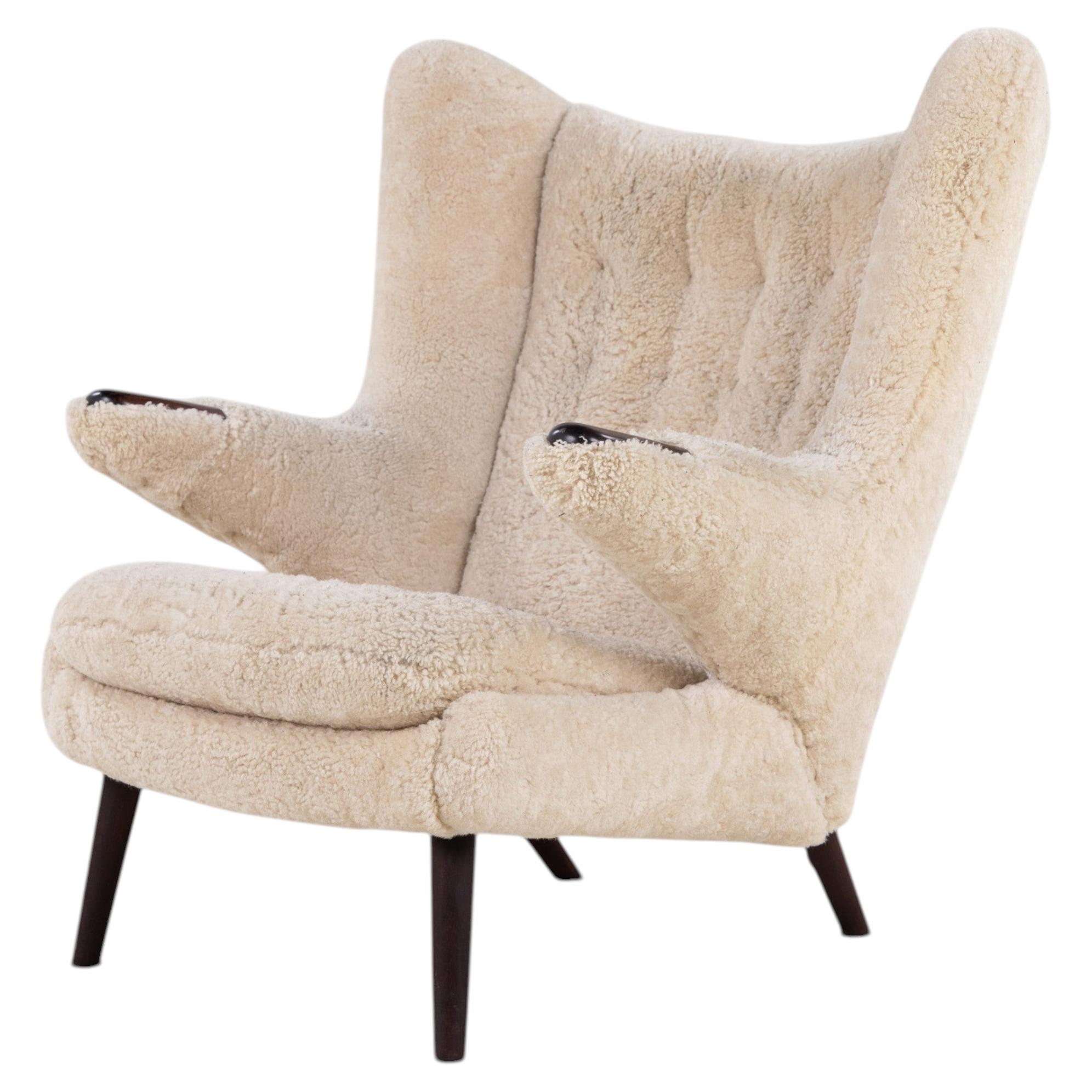 AP 19 - 'Papa bear' chair in lambskin by Hans J. Wegner