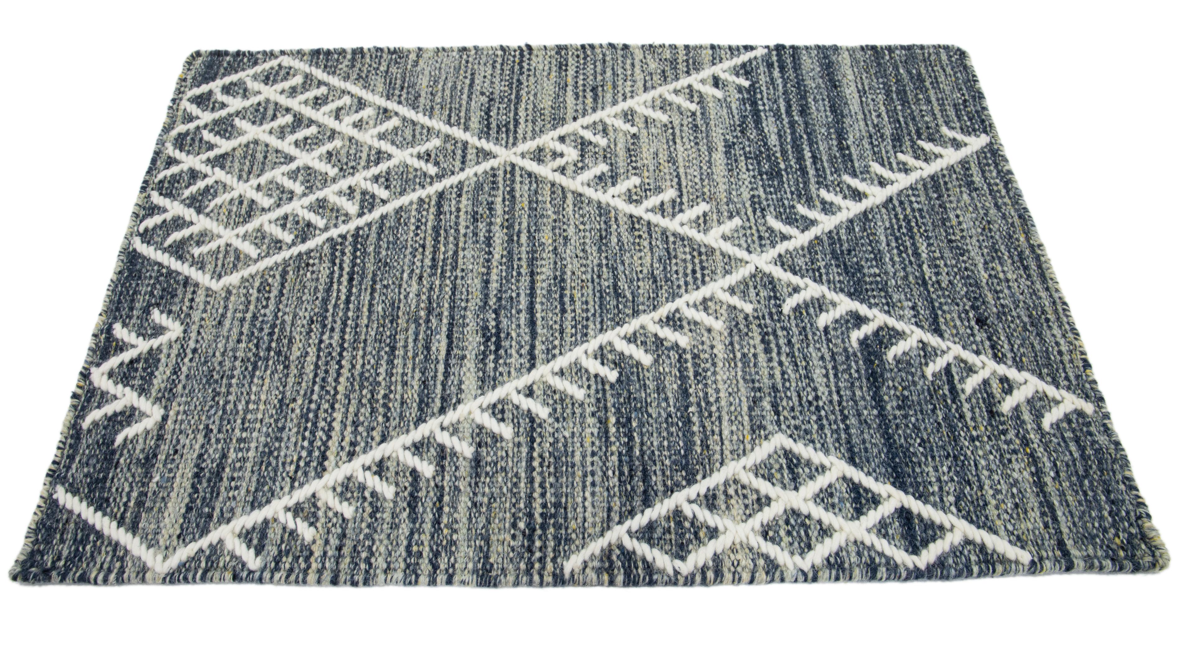 Apadana's Nantucket Collection wool custom rug. Custom sizes and colors made-to-order. 

Material: Wool 
Techniques: Flatweave
Style: Geometric-Coastal
Lead time: Approx. 15-16 wks available 
Colors: As shown, other custom colors are